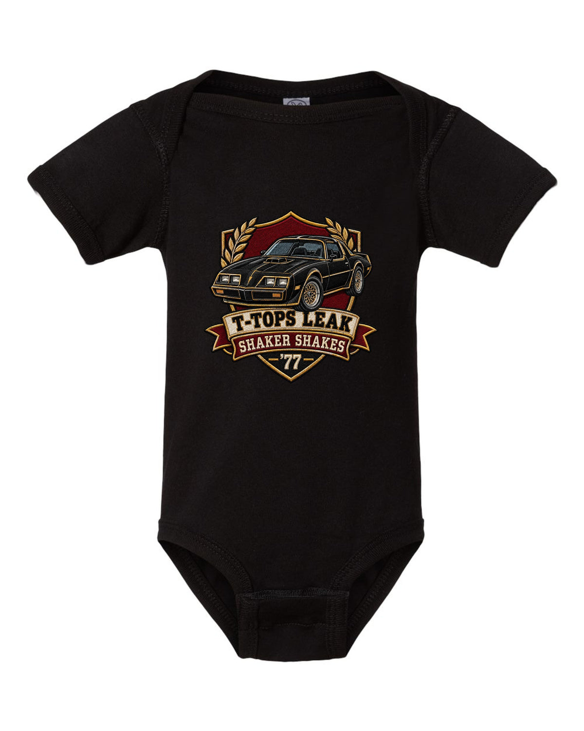 Varsity crest print for a 1977 Pontiac Firebird Trans Am with the text T-Tops Leak, Shaker Shakes, '77 black baby onesie front view with the design