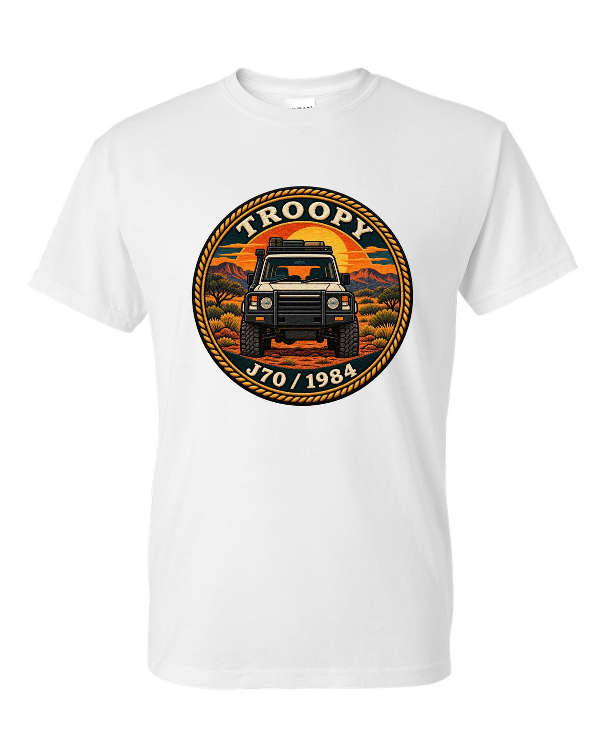 Sunset stamp patch crest of a Toyota Land Cruiser J70 troop carrier with the word Troopy white t-shirt front view with the design
