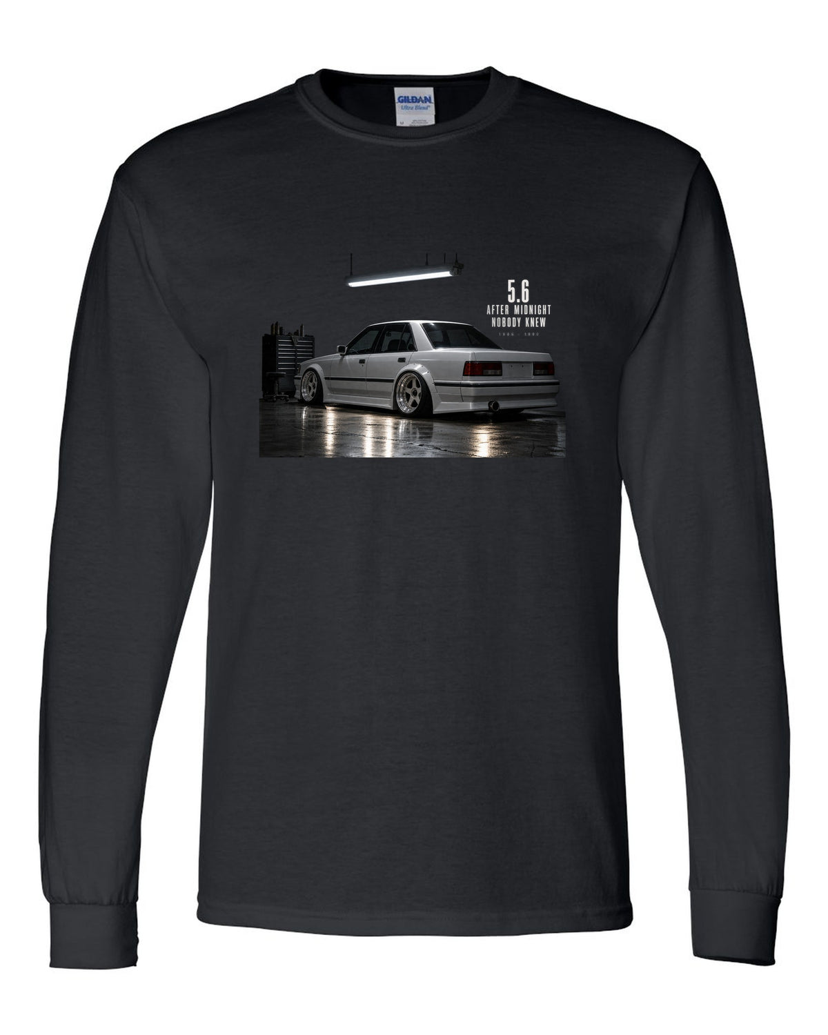 print of a Mercedes W124 300E 5.6 Hammer in a night garage with the text 5.6 After Midnight Nobody Knew black long sleeve front view with the design