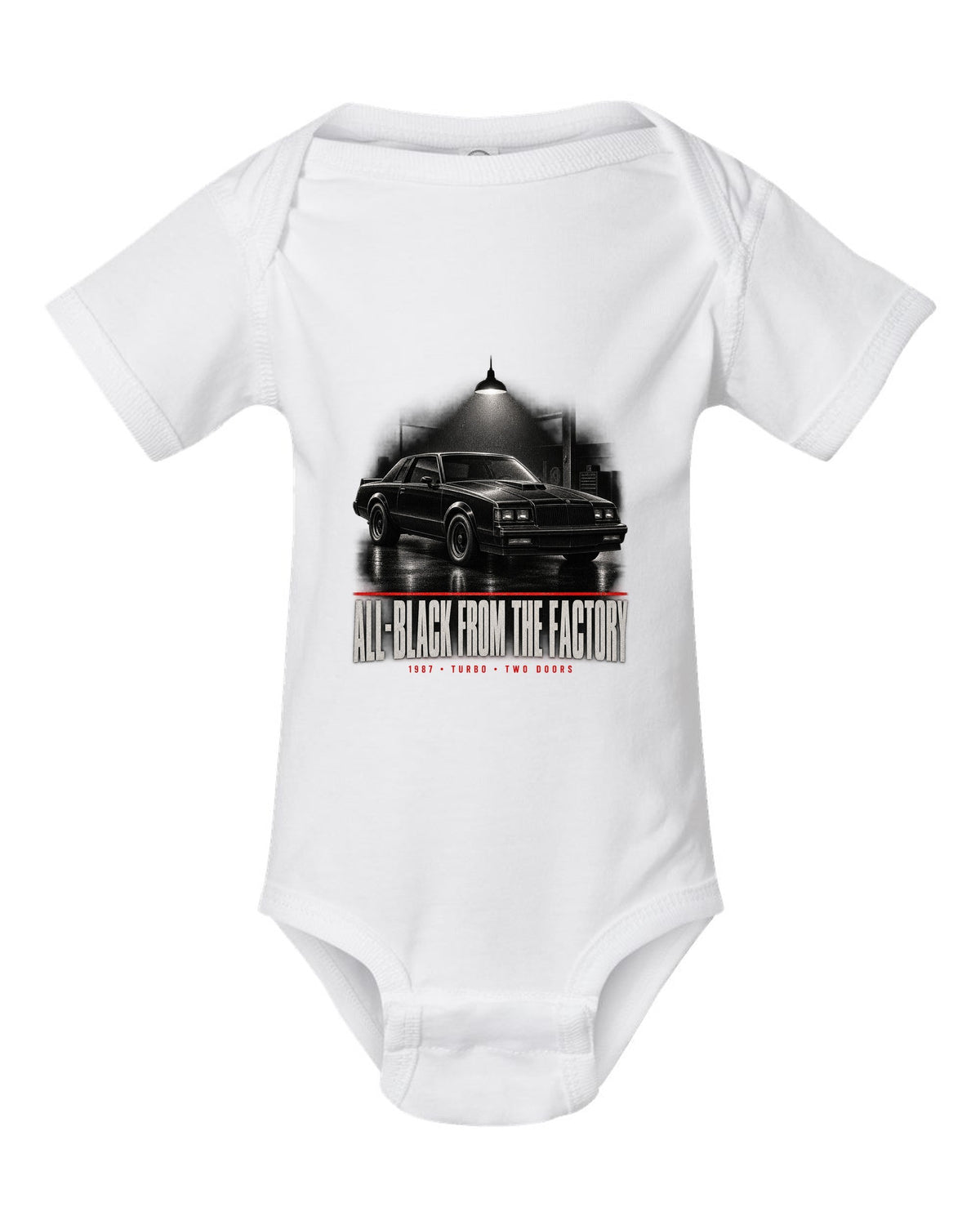 1987 Buick Grand National garage night scene print with all-black text white baby onesie front view with the design