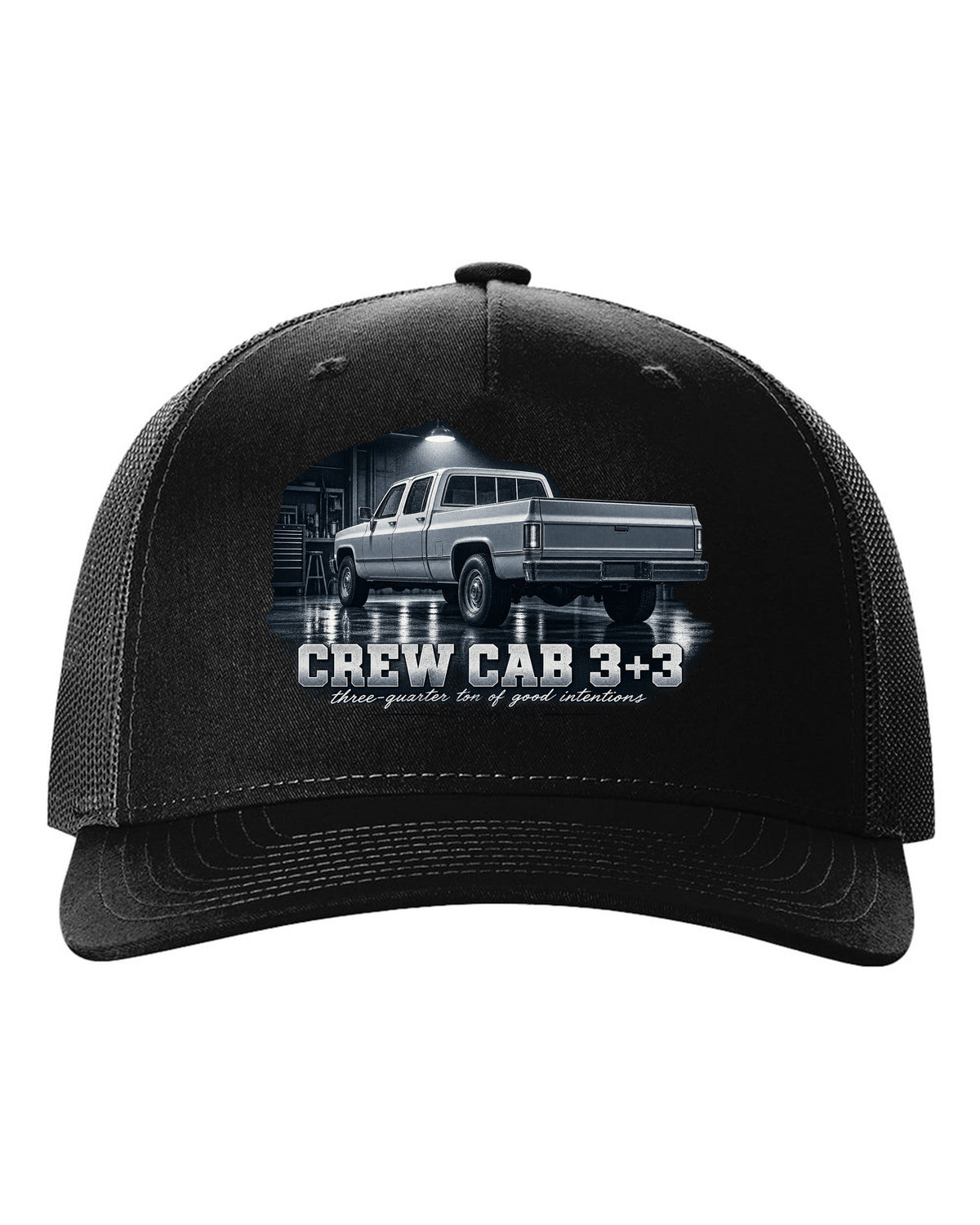 1985 C20 Squarebody crew cab in a garage night scene, print black hat front view with the design