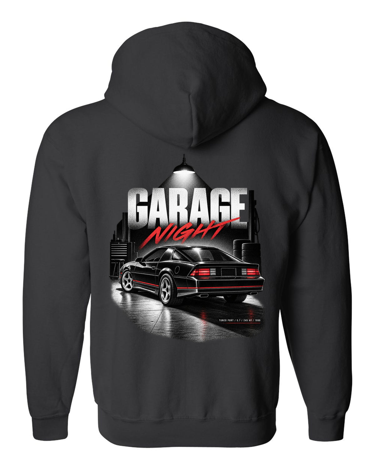 Garage-night print of a 1990 Chevrolet Camaro IROC-Z with tuned port 5.7 245 hp text black zip hoodie back view with the design