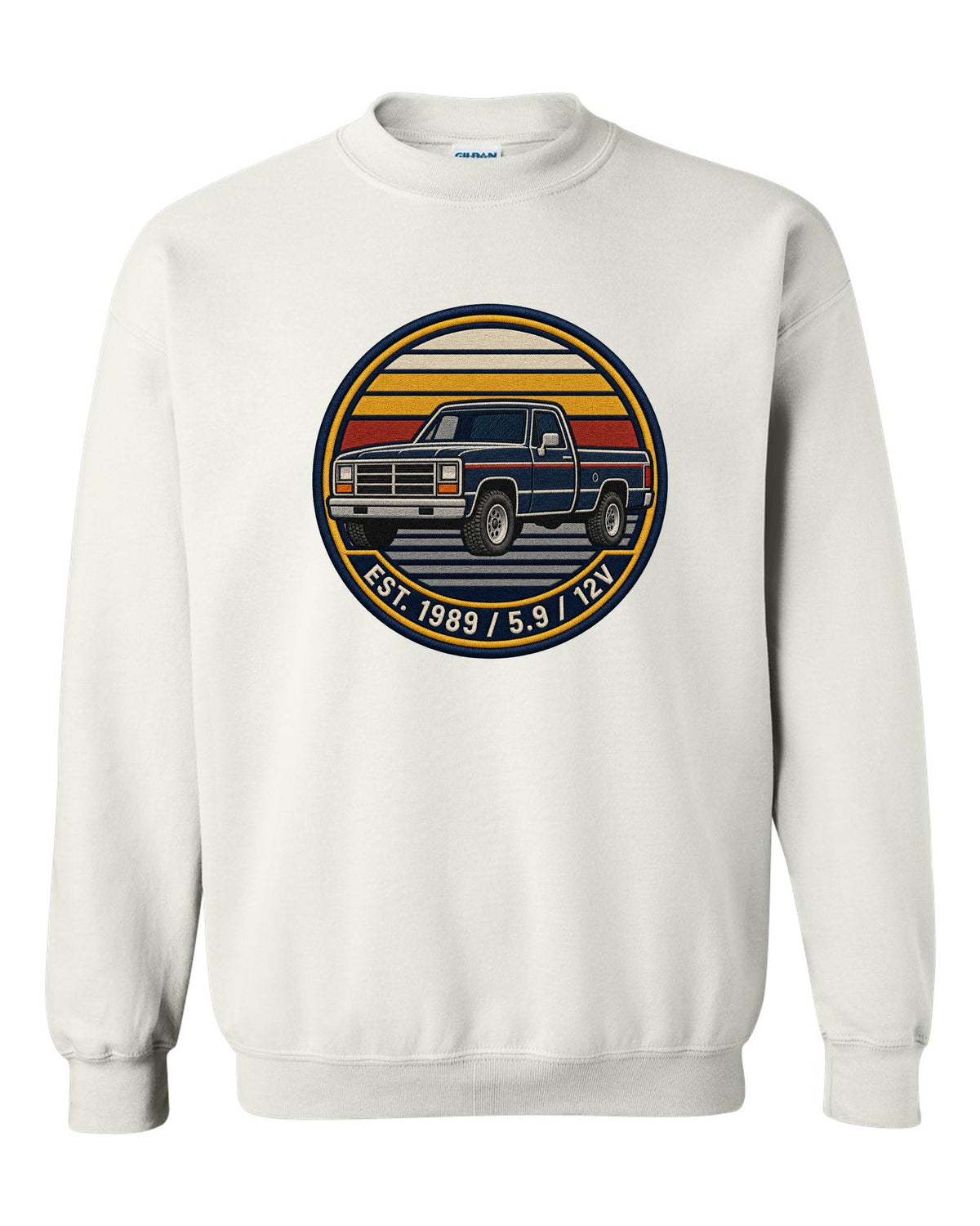Varsity-style grille crest print of a 1989-1993 Dodge Ram 1st gen with Est. 1989 5.9 12V text white crewneck front view with the design