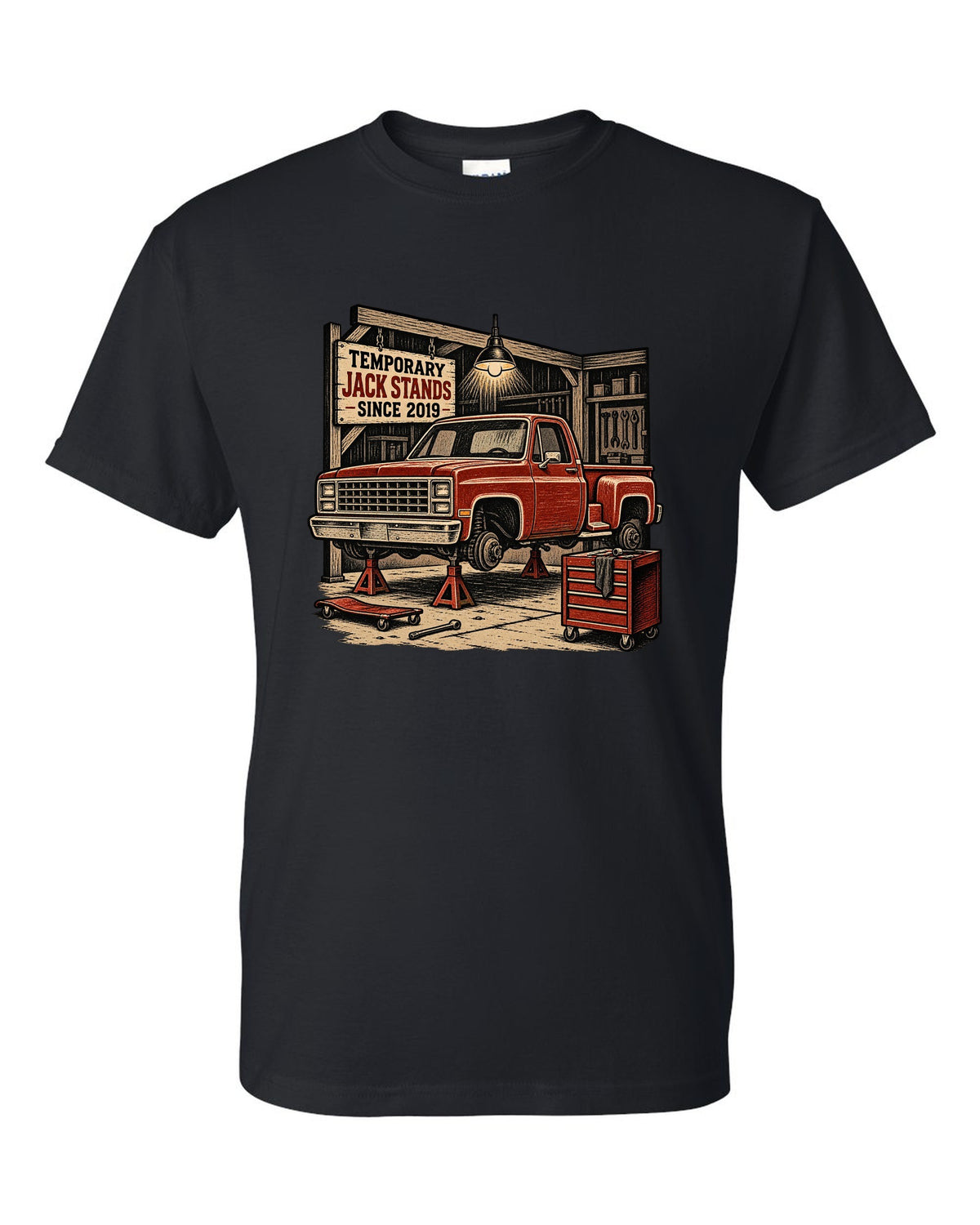 Linocut woodcut style print of a 1973-87 Chevrolet C10 Squarebody Stepside in a workshop with jack stands lettering black t-shirt front view with the design