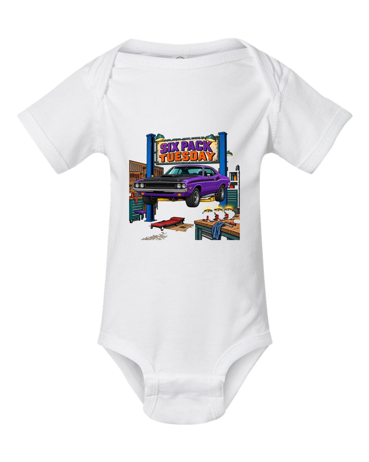 Garage workshop scene with a 1970 Dodge Challenger T/A on a lift and Six Pack Tuesday text white baby onesie front view with the design