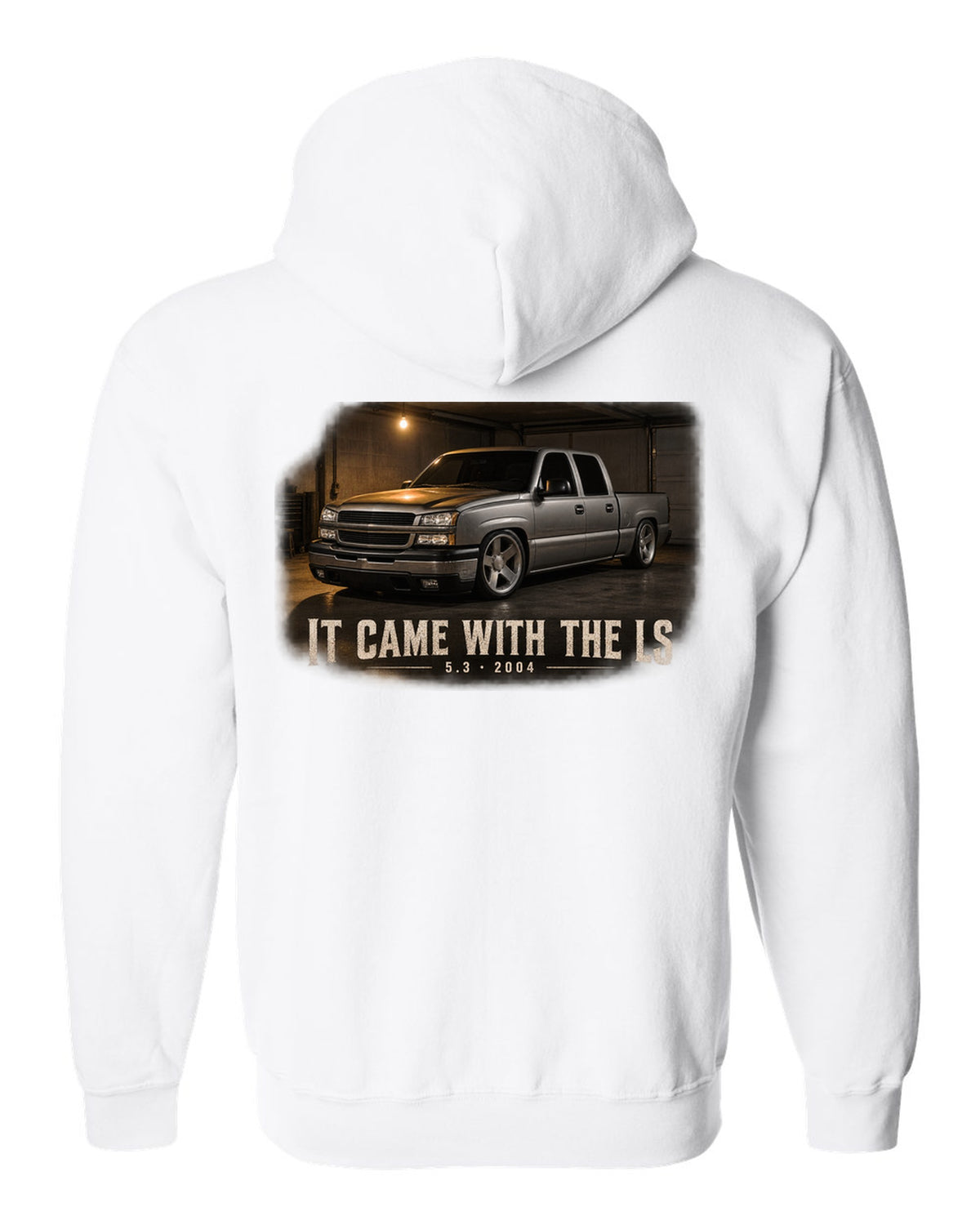 2004 Chevy Silverado crew cab in a garage night scene, print white zip hoodie back view with the design