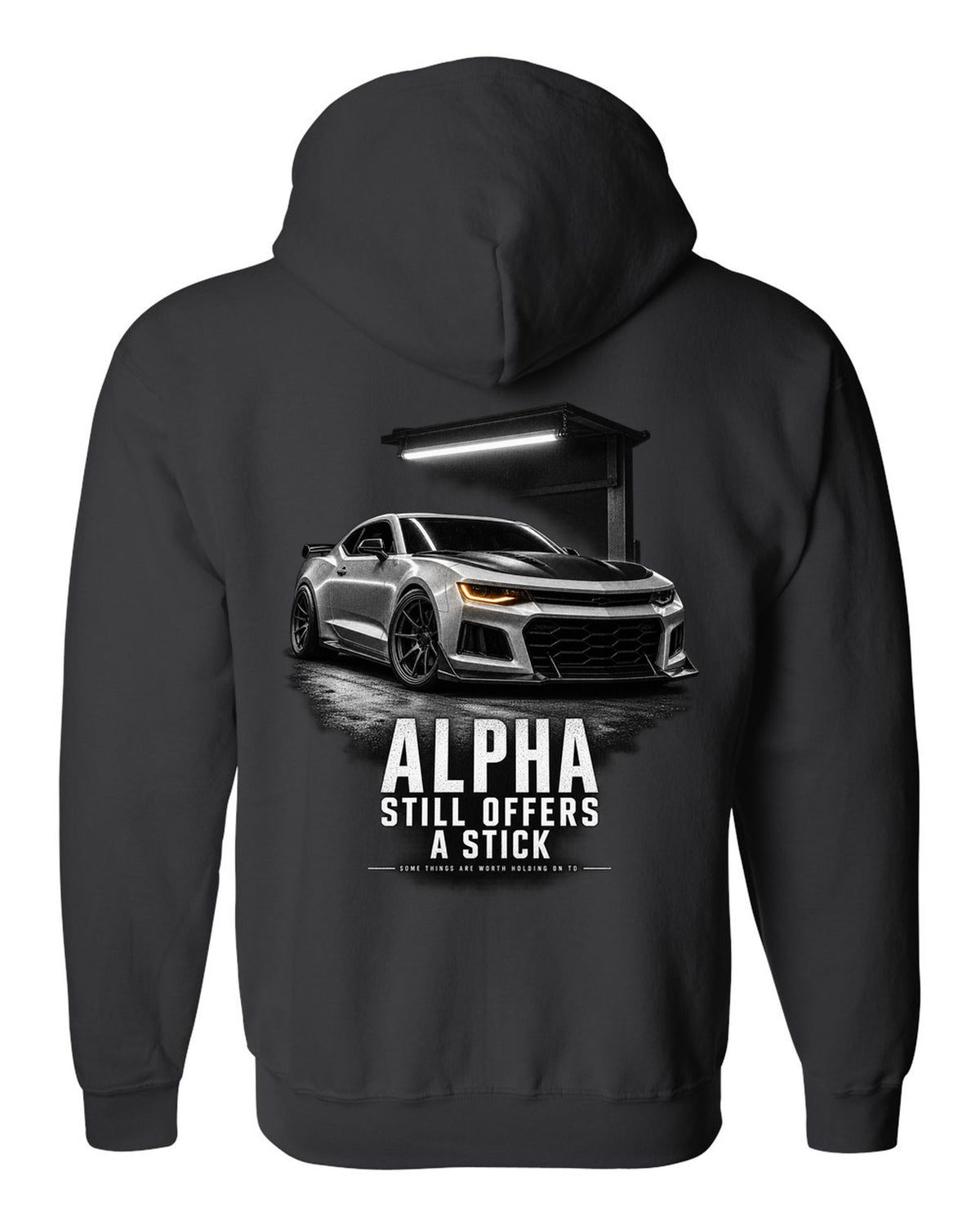 Garage-night print of a 2018 Chevrolet Camaro SS 1LE sixth-gen front three-quarter with Alpha text black zip hoodie back view with the design