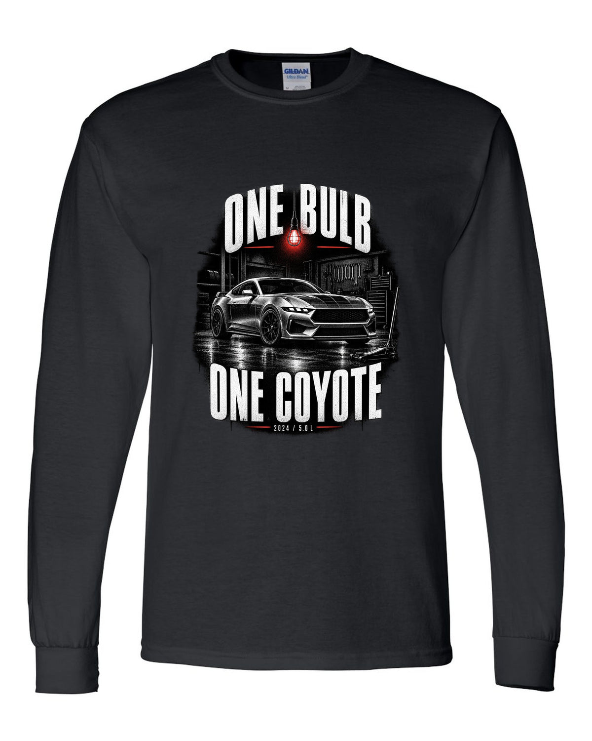 Ford Mustang S650 GT coupe in a dimly lit garage, one bulb one Coyote print black long sleeve front view with the design