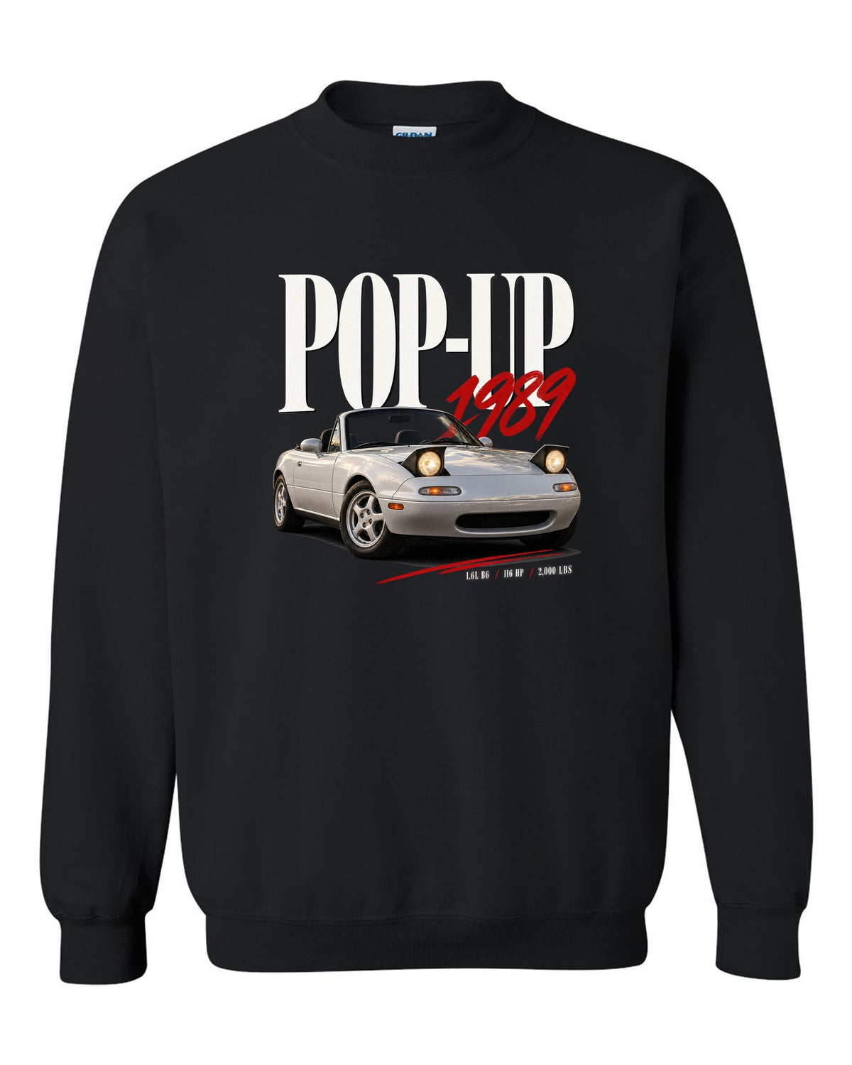 Editorial headline print for the Mazda MX-5 NA 1989-97 reading pop-up, 1989, 1.6L B6 black crewneck front view with the design