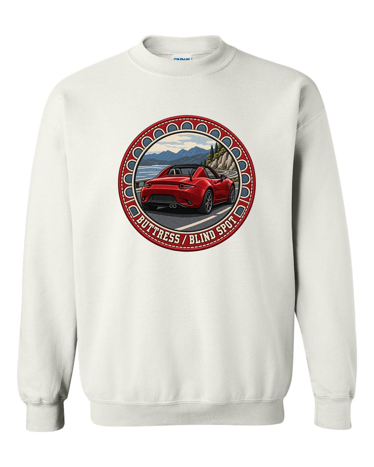 Embroidery-style roundel crest of a Mazda MX-5 ND RF fastback with blind spot text white crewneck front view with the design