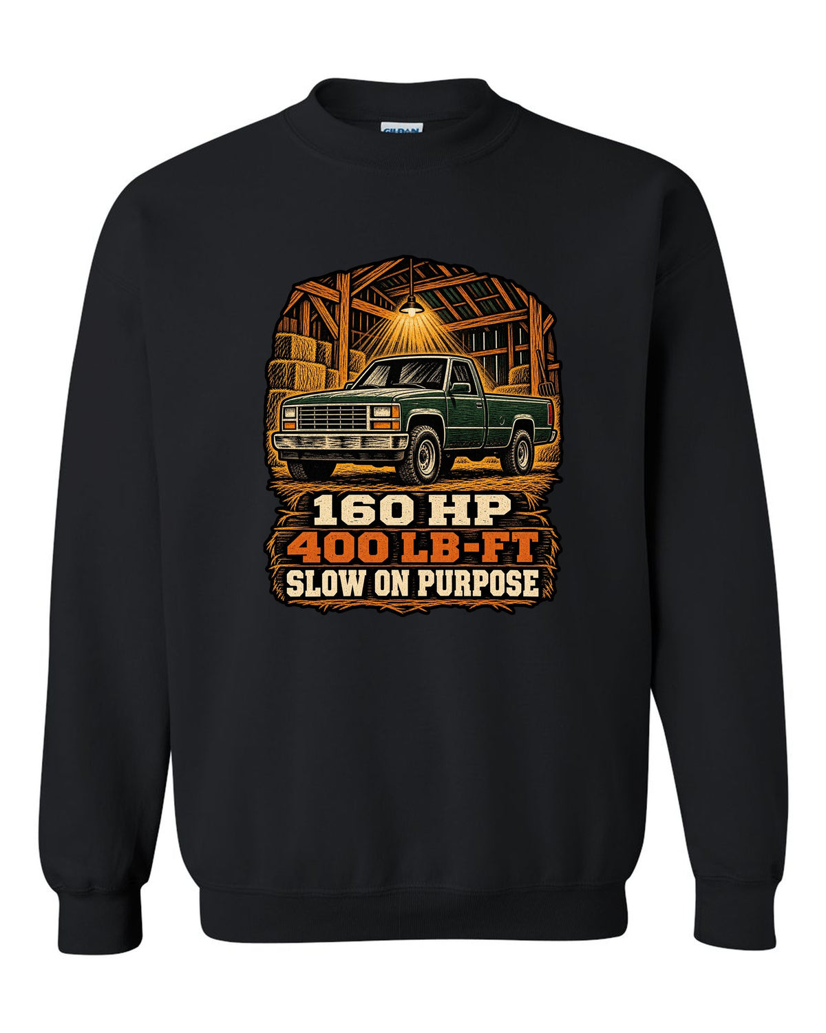Woodcut style print of a 1989-1993 Dodge Ram D250 Cummins on an oversized shirt black crewneck front view with the design