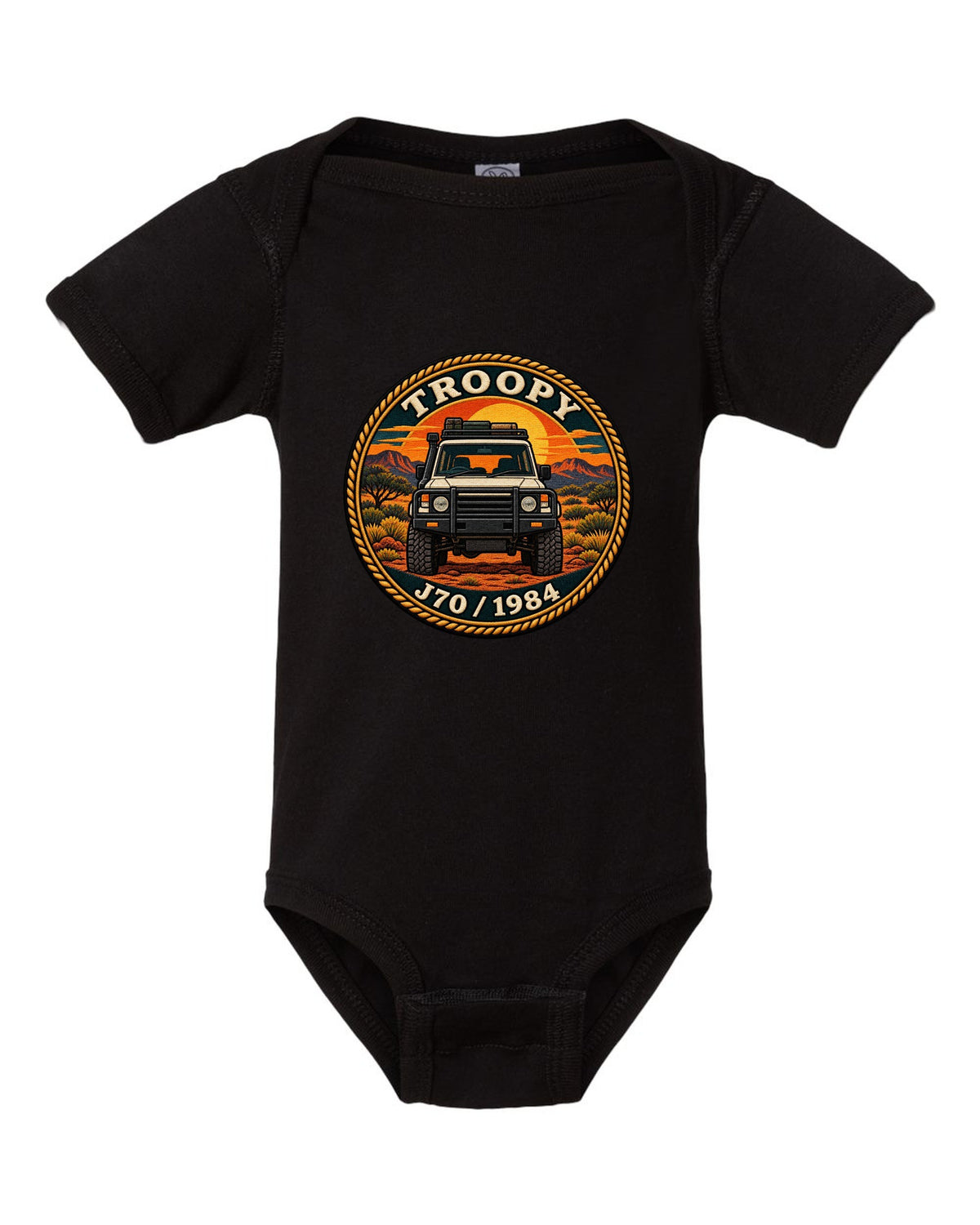 Sunset stamp patch crest of a Toyota Land Cruiser J70 troop carrier with the word Troopy black baby onesie front view with the design