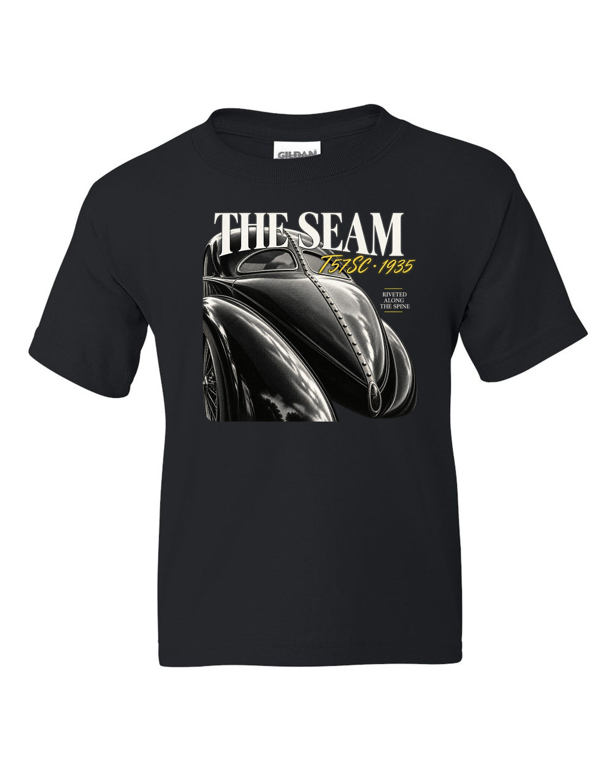 Close macro print of the riveted dorsal seam on a 1935 Bugatti Type 57SC Atlantic black kids tee front view with the design