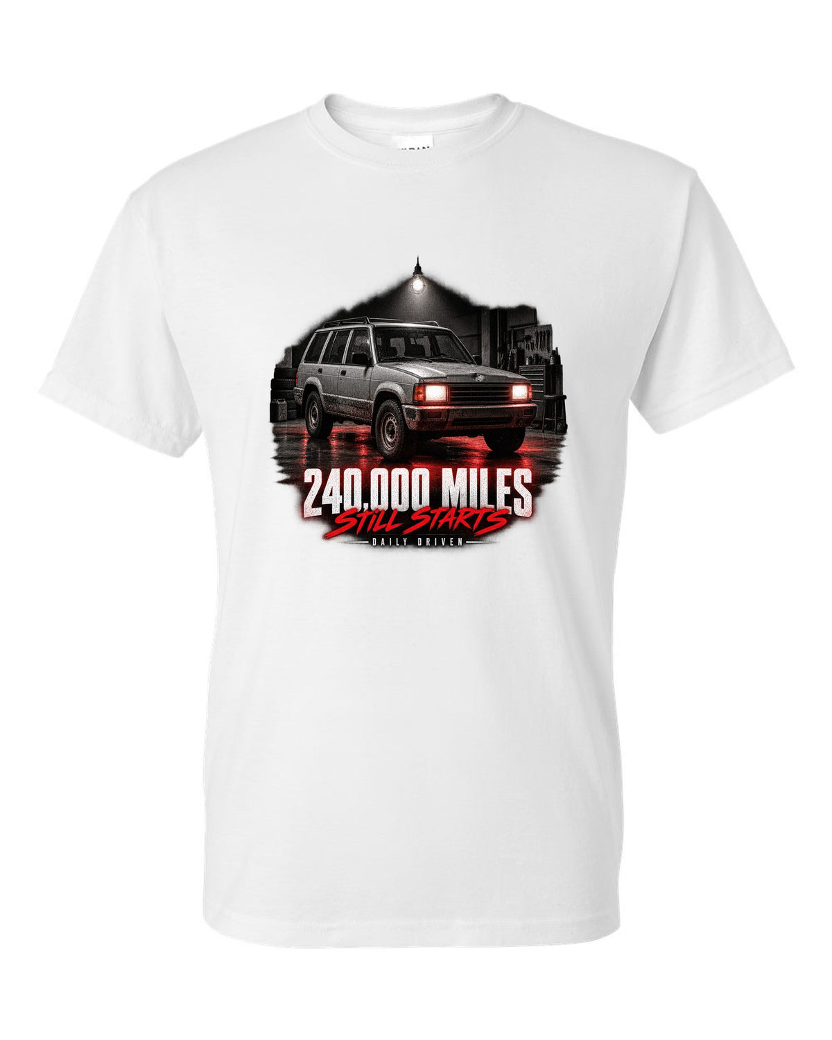 Jeep Cherokee XJ at night with daily driven 240,000 miles print white t-shirt front view with the design