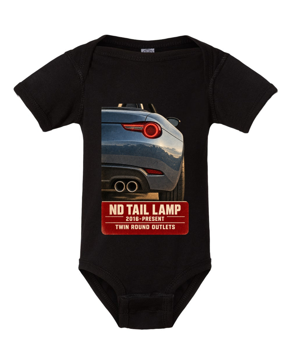 Macro poster-style print of the tail lamp and twin round exhaust outlets on a Mazda MX-5 ND black baby onesie front view with the design