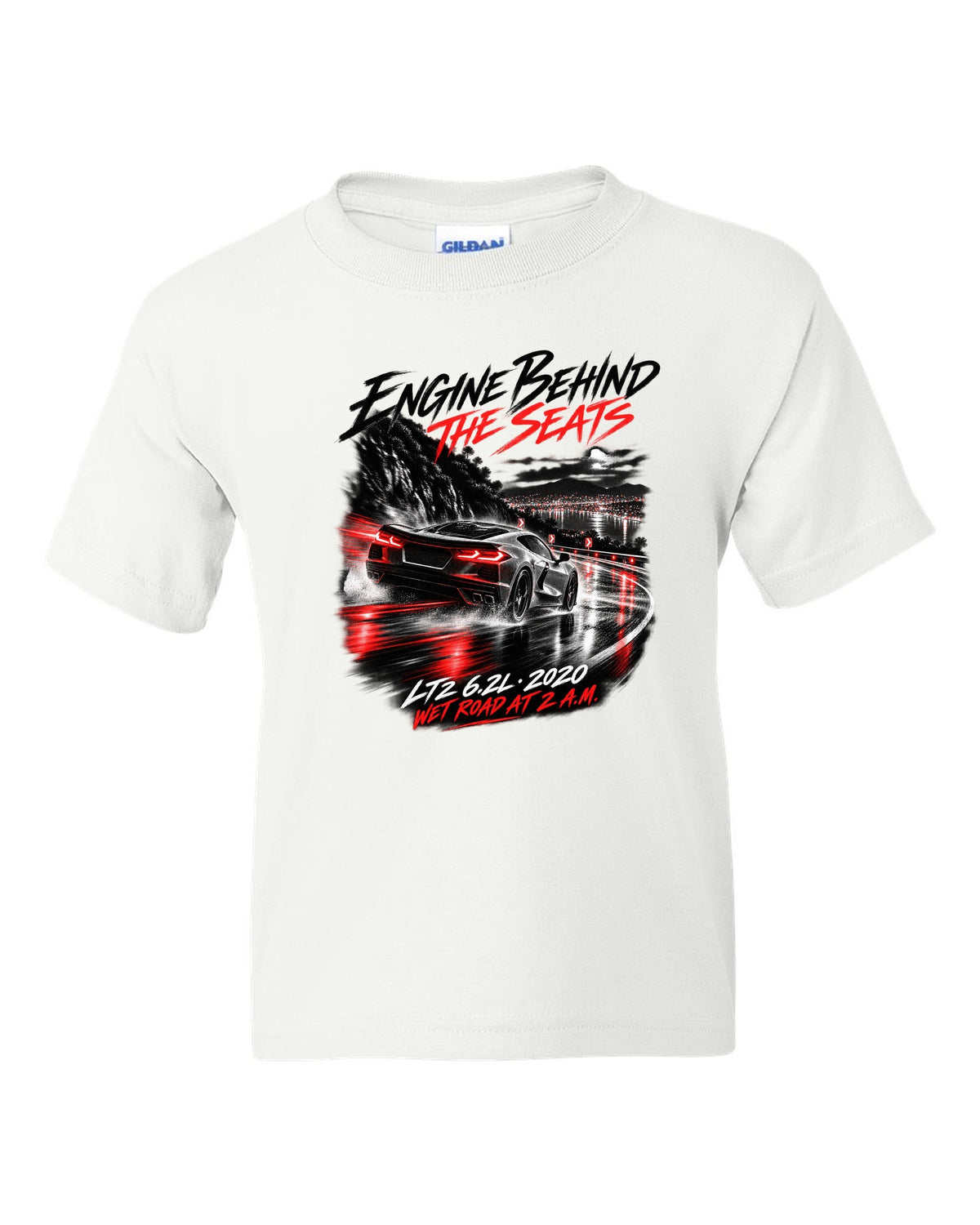 Corvette C8 Stingray driving on a wet road at night white kids tee front view with the design
