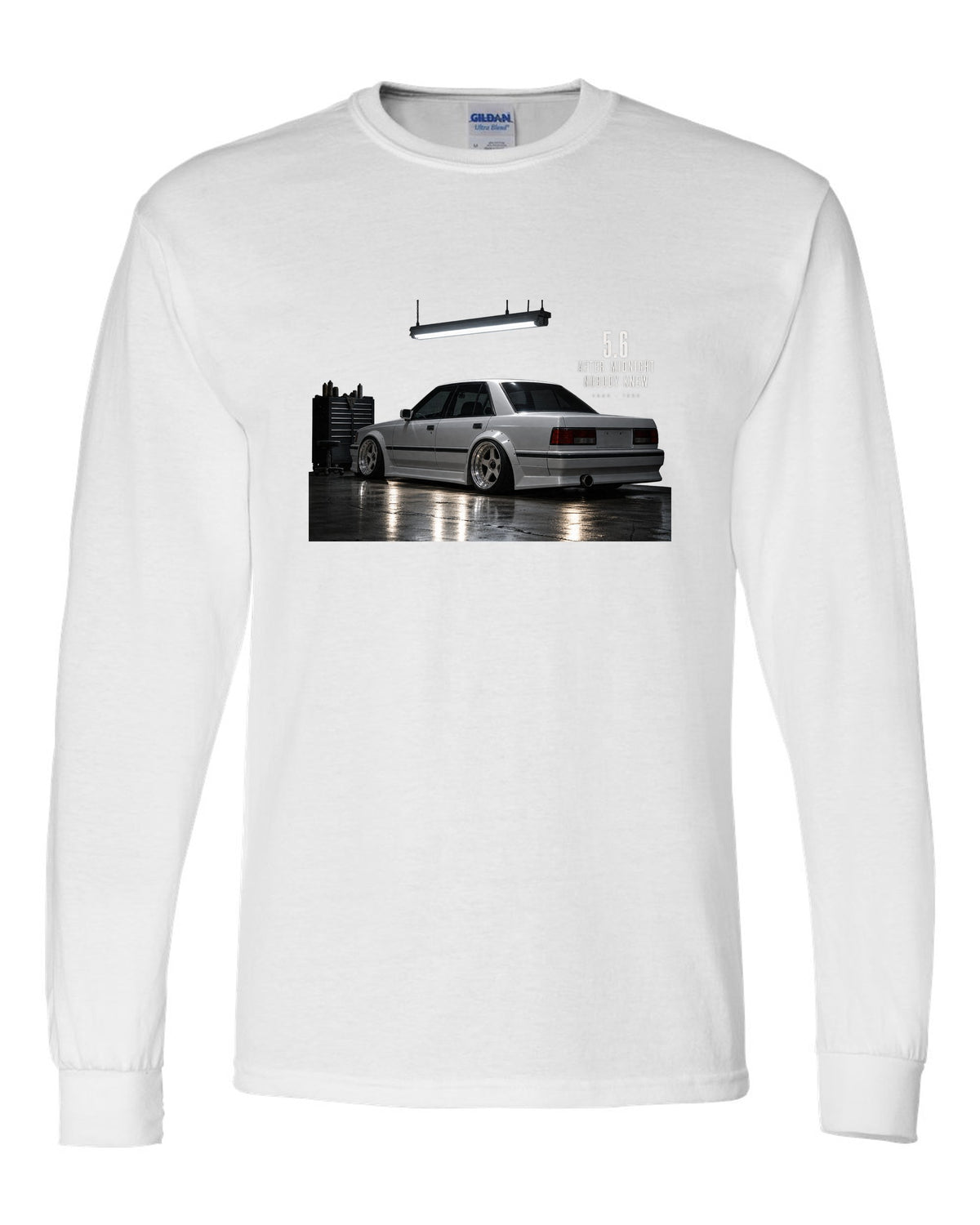 print of a Mercedes W124 300E 5.6 Hammer in a night garage with the text 5.6 After Midnight Nobody Knew white long sleeve front view with the design