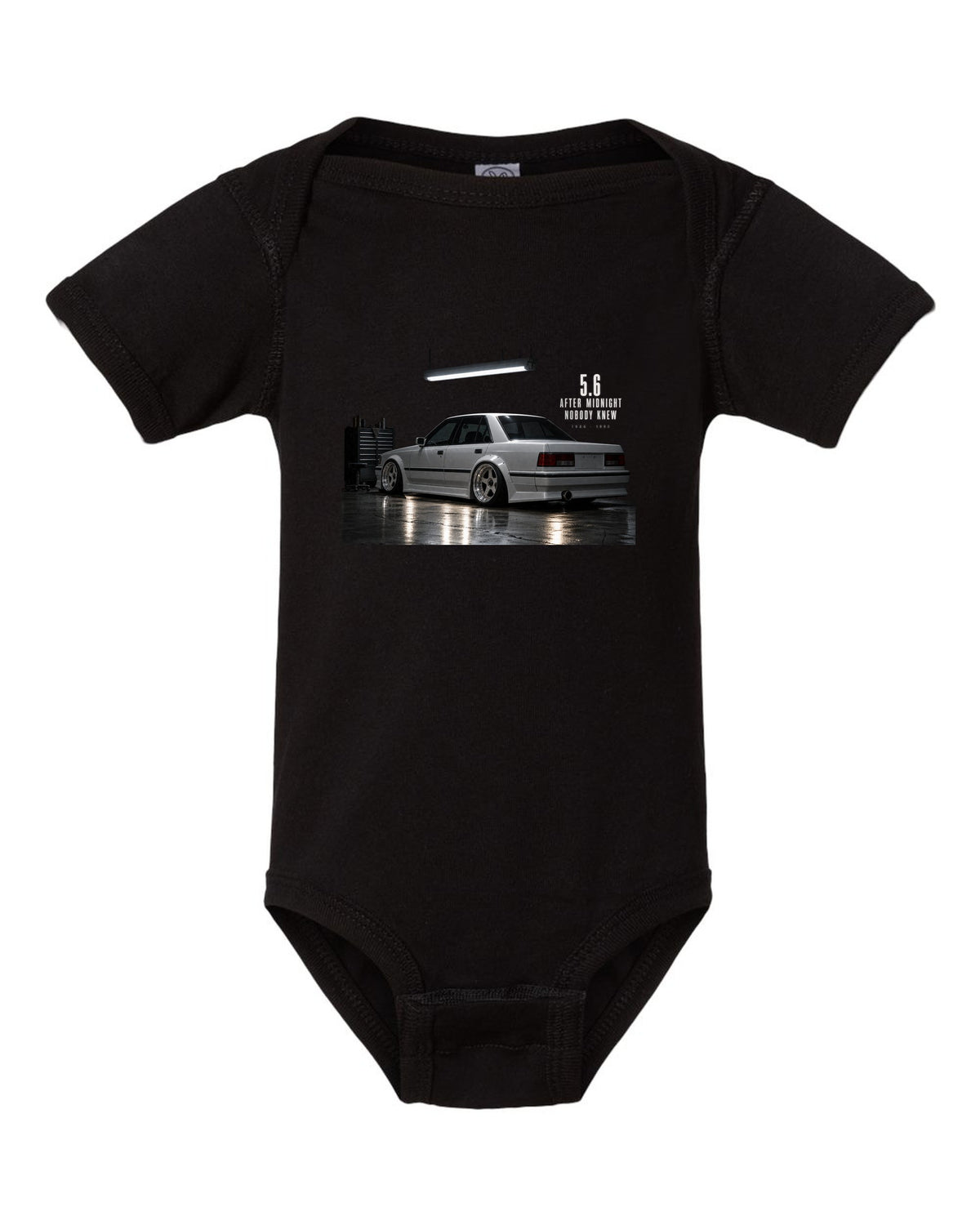 print of a Mercedes W124 300E 5.6 Hammer in a night garage with the text 5.6 After Midnight Nobody Knew black baby onesie front view with the design