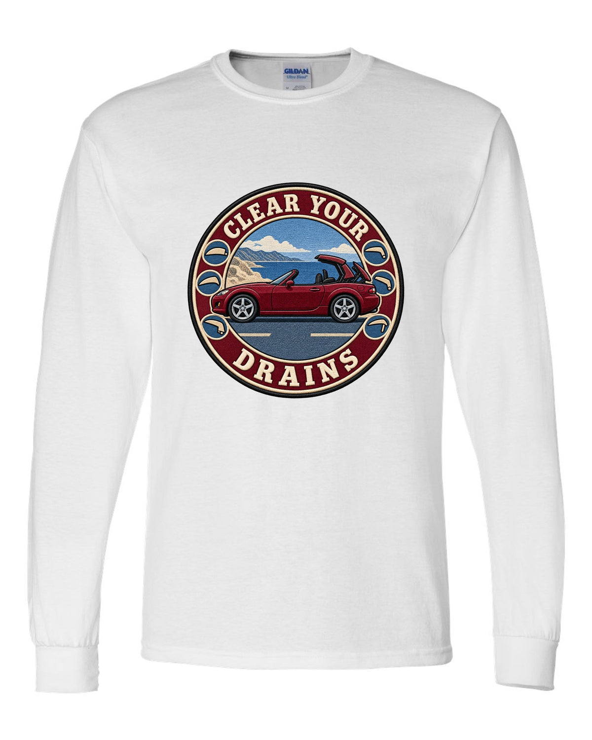 Embroidery-style roundel crest of a Mazda MX-5 NC with clear your drains text white long sleeve front view with the design