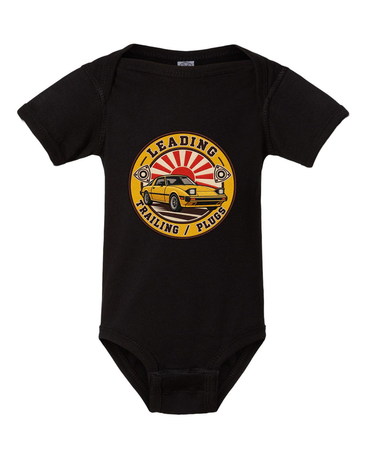 Embroidery-style roundel crest of a Mazda RX-7 SA22C with rotary plug text black baby onesie front view with the design