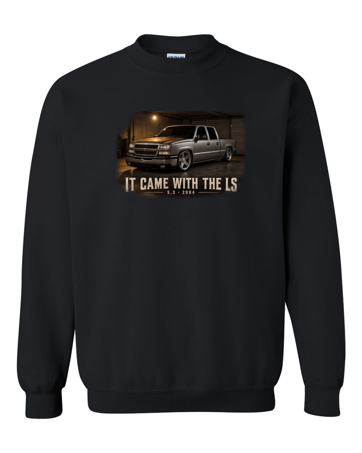 2004 Chevy Silverado crew cab in a garage night scene, print black crewneck front view with the design