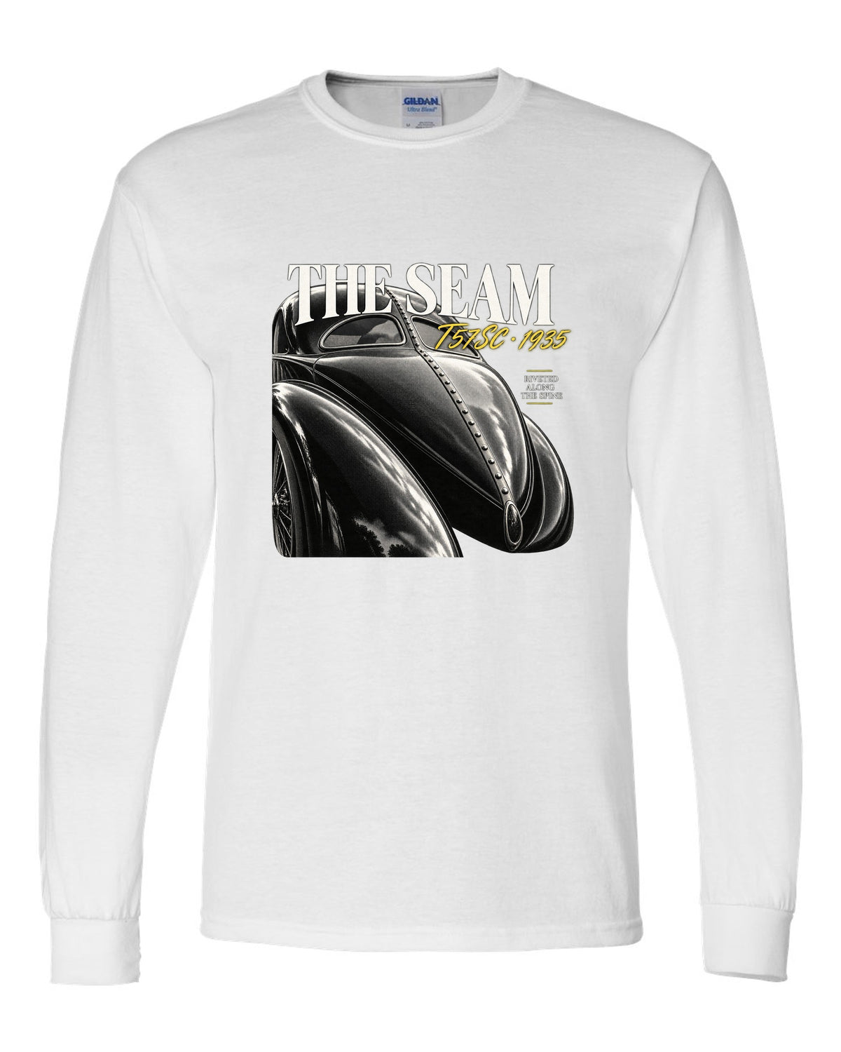 Close macro print of the riveted dorsal seam on a 1935 Bugatti Type 57SC Atlantic white long sleeve front view with the design