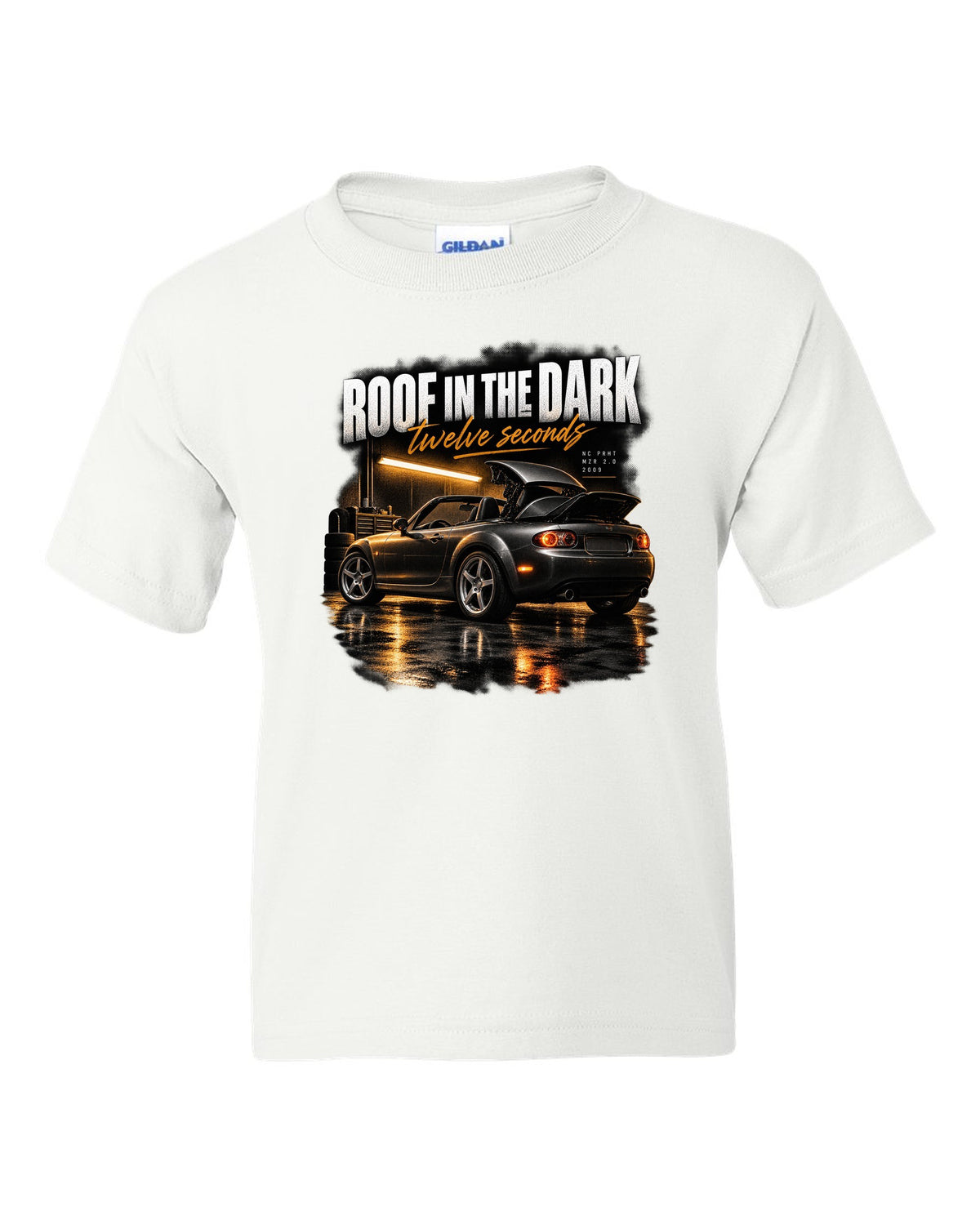 Garage night print of a Mazda MX-5 NC PRHT with the roof folding white kids tee front view with the design