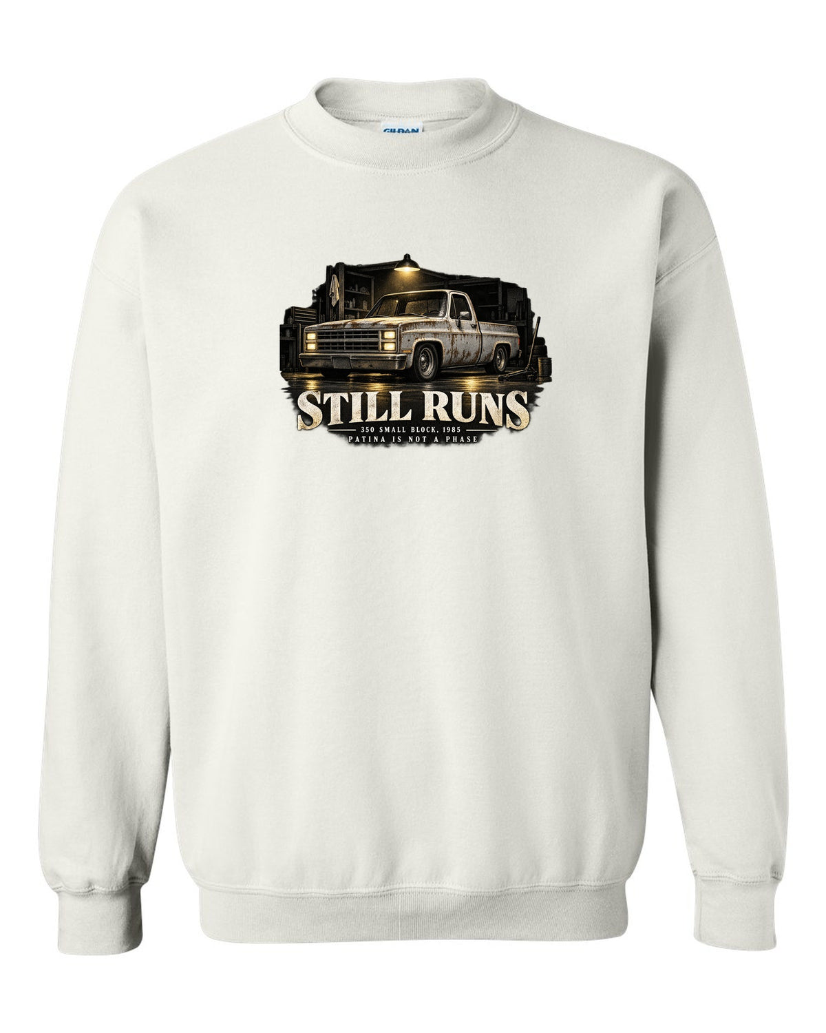 Night garage print of a 1973-87 Chevrolet C10 Squarebody with 350 small block text white crewneck front view with the design