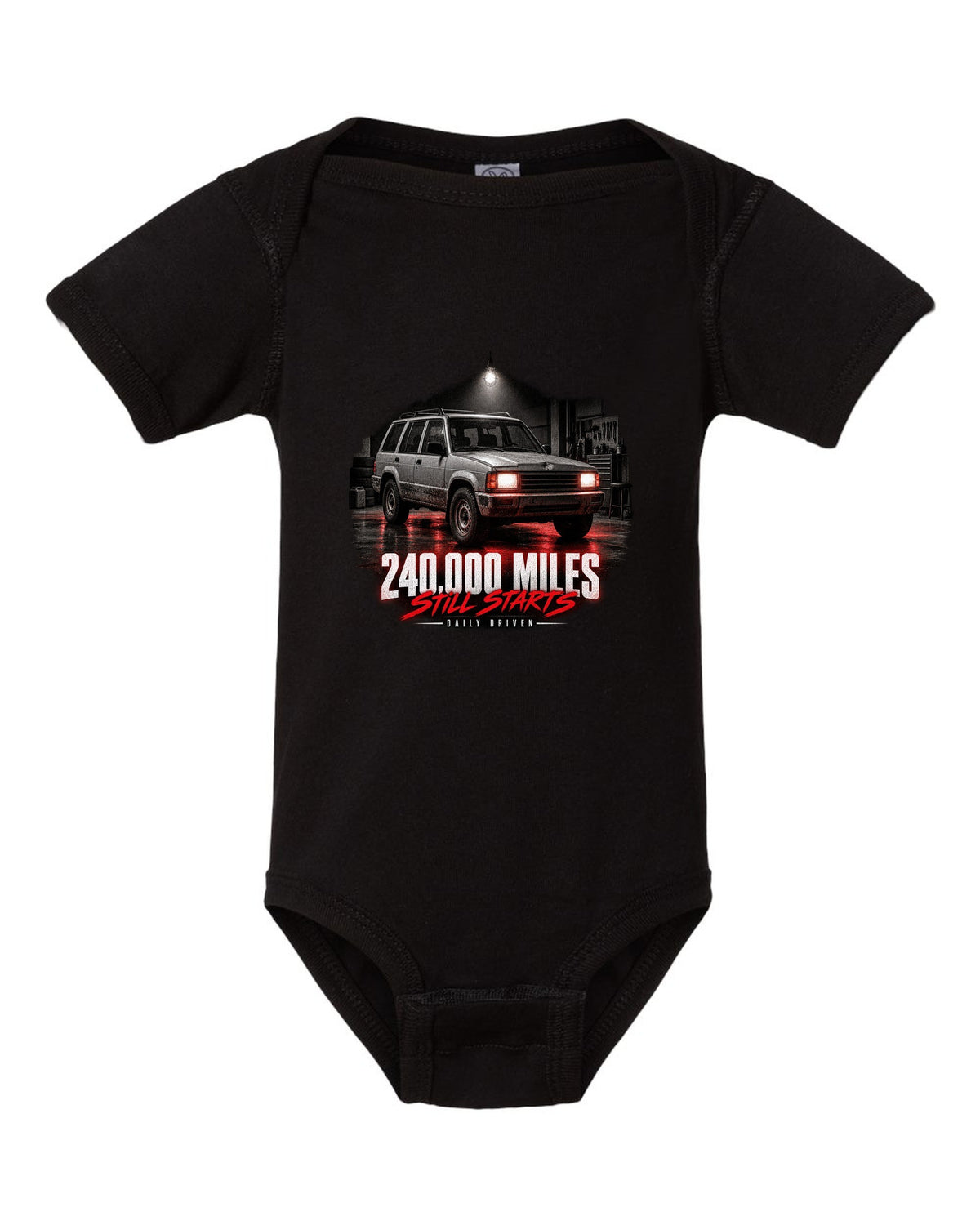 Jeep Cherokee XJ at night with daily driven 240,000 miles print black baby onesie front view with the design