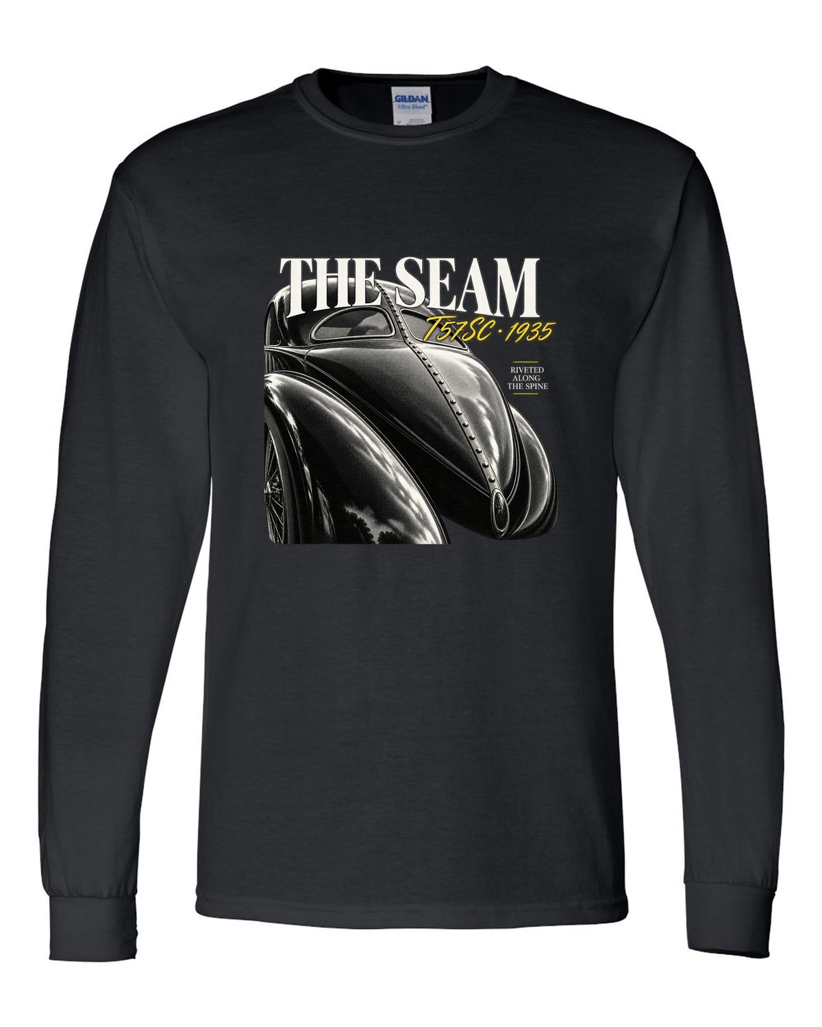 Close macro print of the riveted dorsal seam on a 1935 Bugatti Type 57SC Atlantic black long sleeve front view with the design