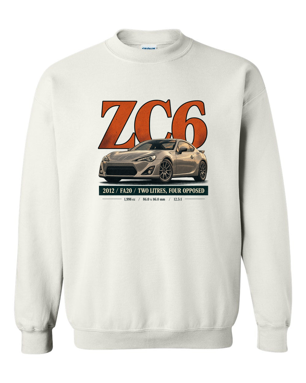 Magazine-style headline layout of a first-generation Subaru BRZ ZC6 print white crewneck front view with the design