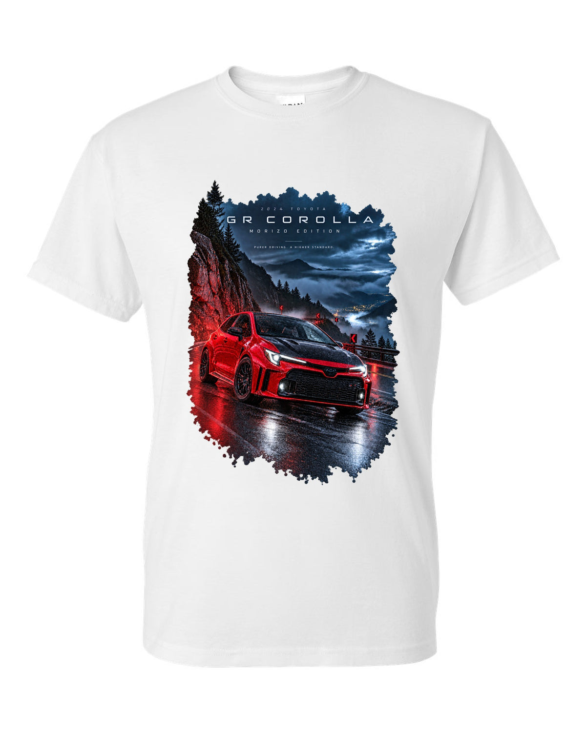 Toyota GR Corolla Morizo Edition on a wet mountain road at night white t-shirt front view with the design