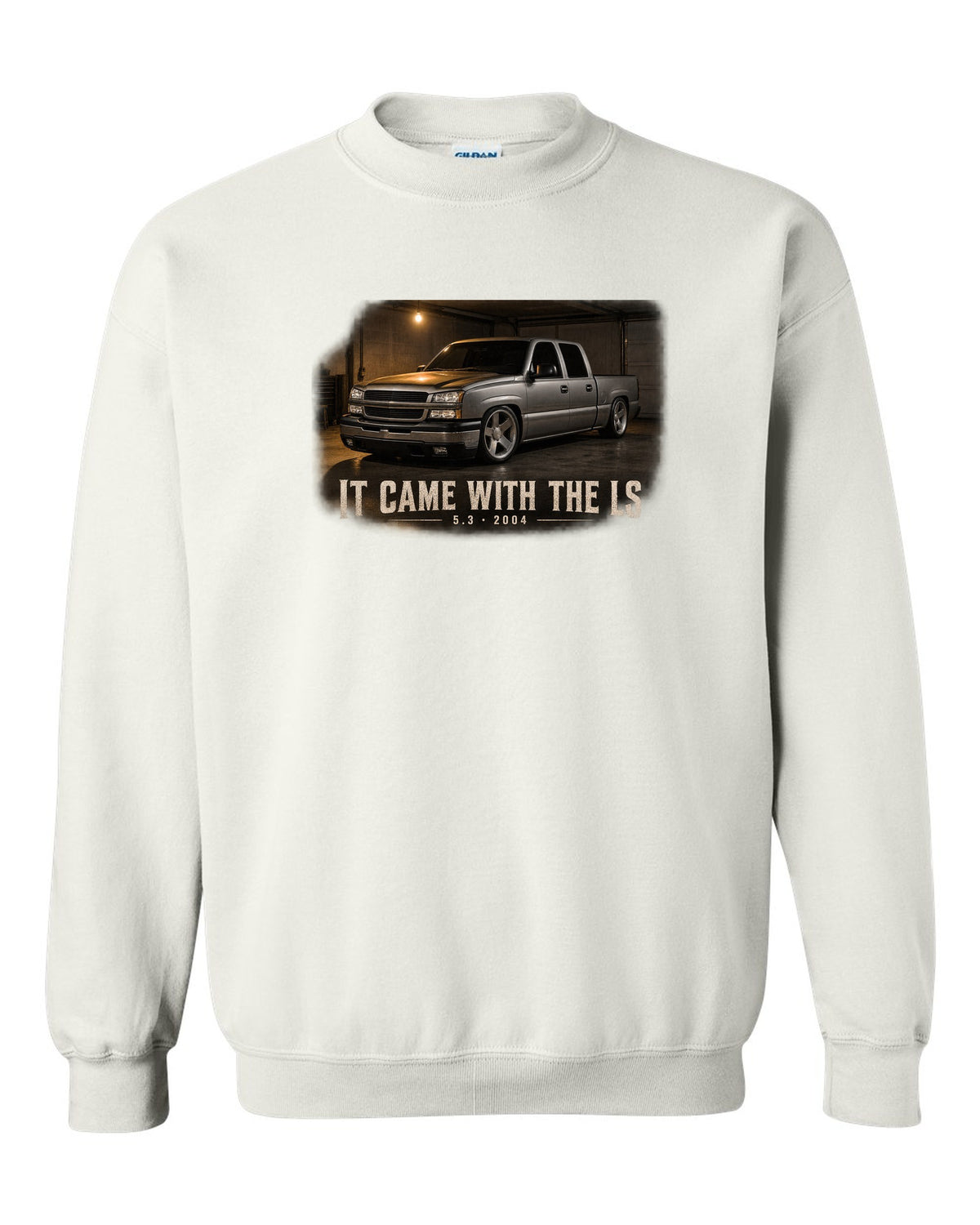2004 Chevy Silverado crew cab in a garage night scene, print white crewneck front view with the design