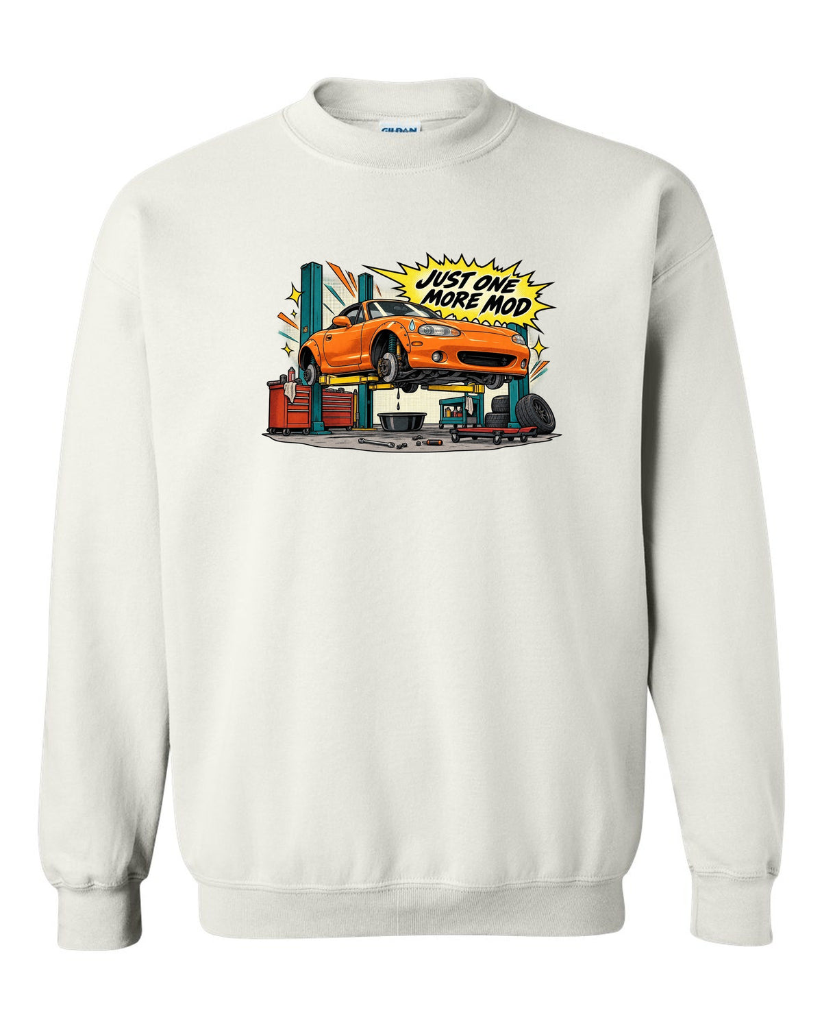 Retro manga halftone panel print of a Mazda MX-5 NB in a workshop with the text Just One More Mod white crewneck front view with the design