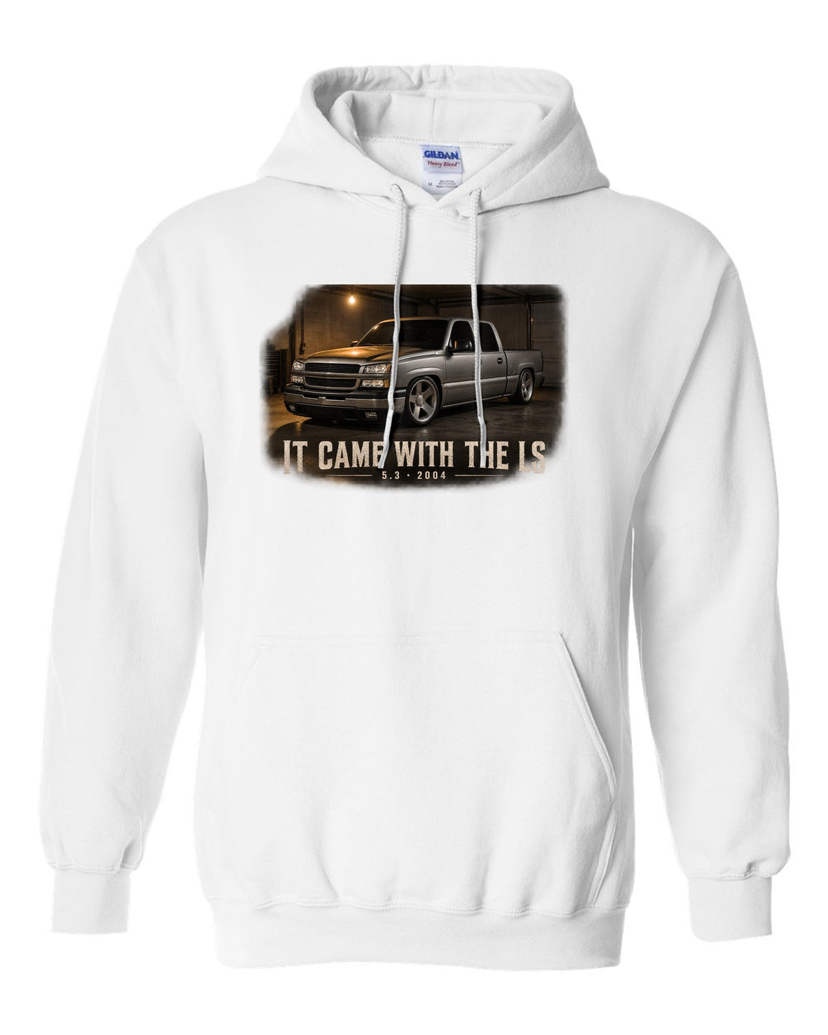 2004 Chevy Silverado crew cab in a garage night scene, print white pull over hoodie front view with the design