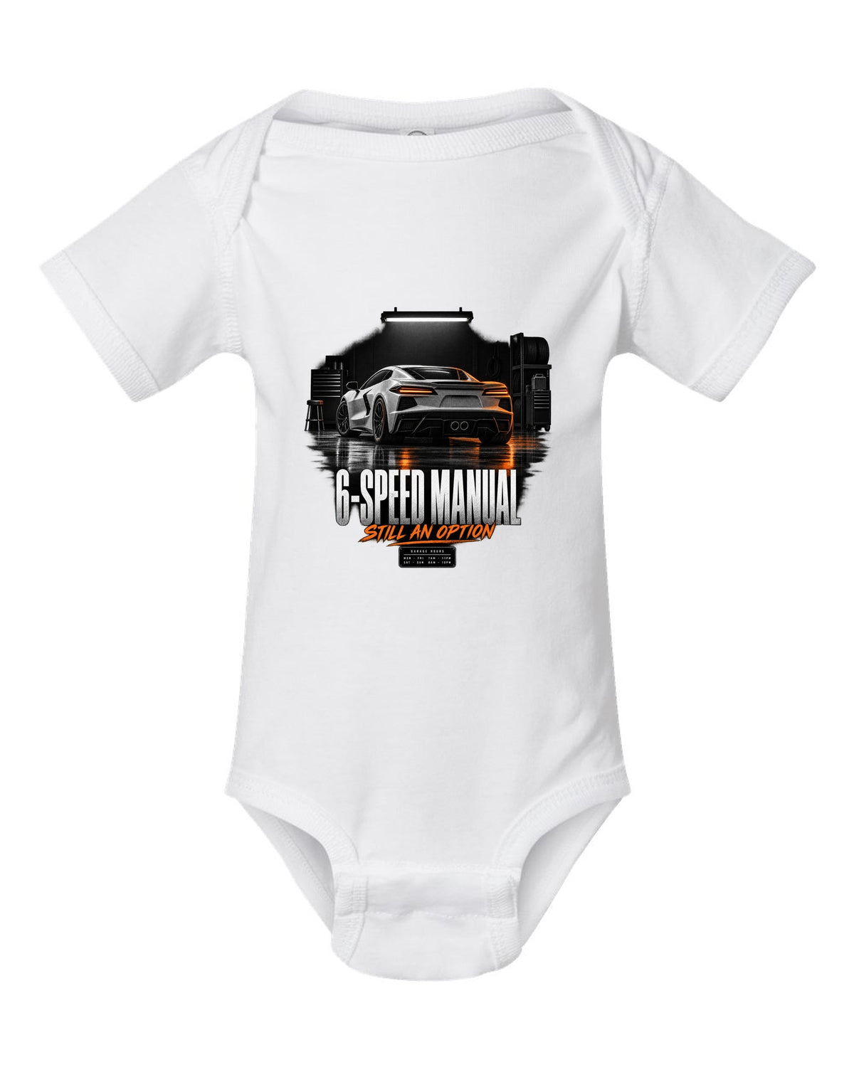 Lotus Emira V6 in a garage at night with 6-speed manual text white baby onesie front view with the design