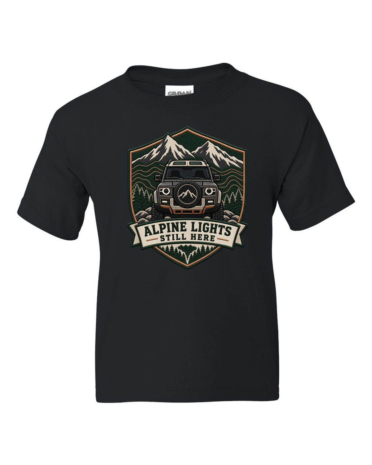 Original shield crest print for a Land Rover Defender L663 with Alpine Lights Still Here text black kids tee front view with the design