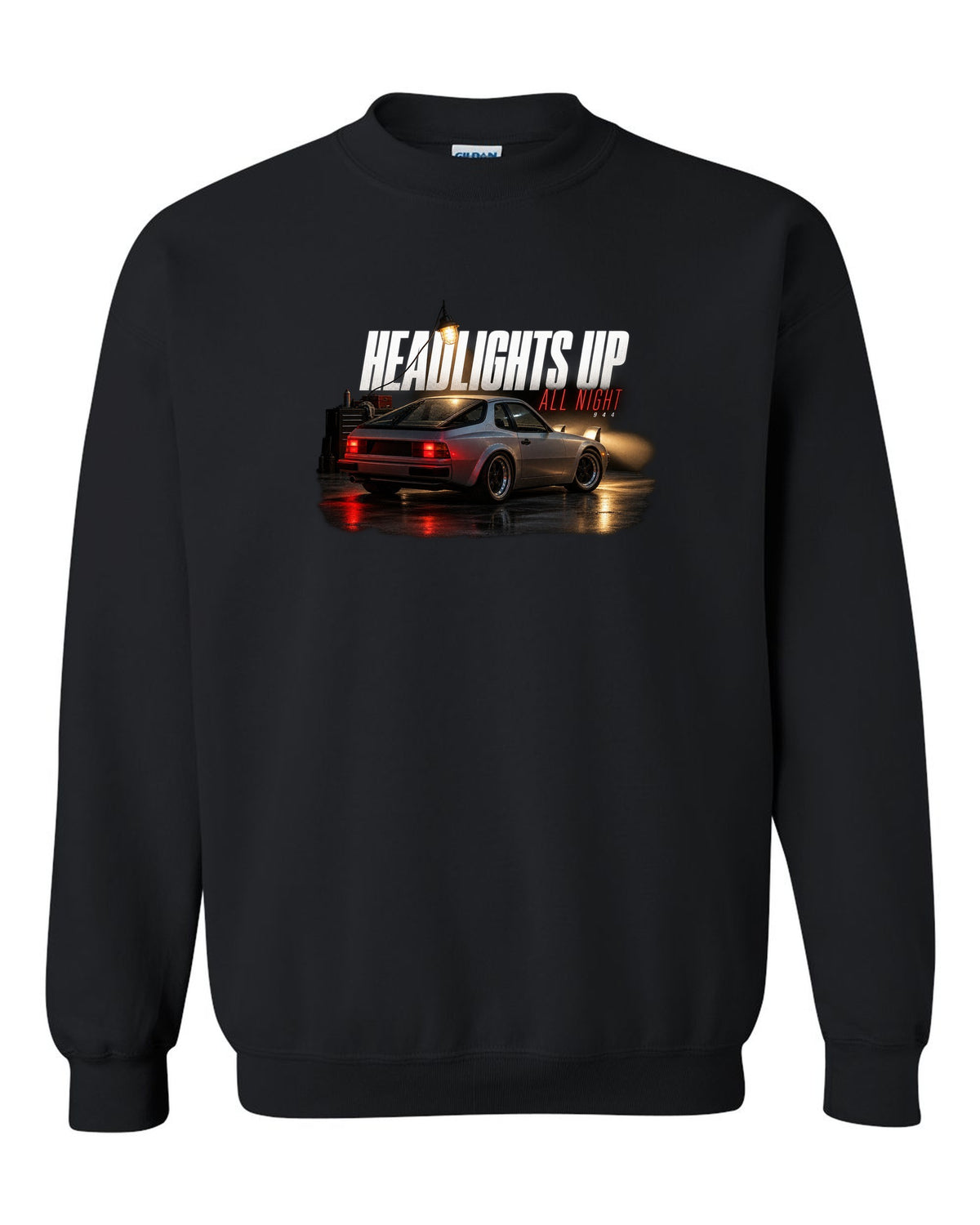 Garage night print of an early Porsche 944 with pop-up headlights raised black crewneck front view with the design