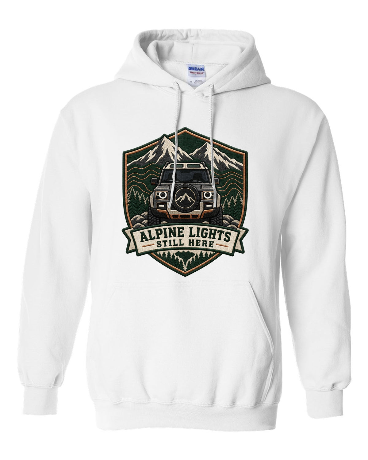 Original shield crest print for a Land Rover Defender L663 with Alpine Lights Still Here text white pull over hoodie front view with the design
