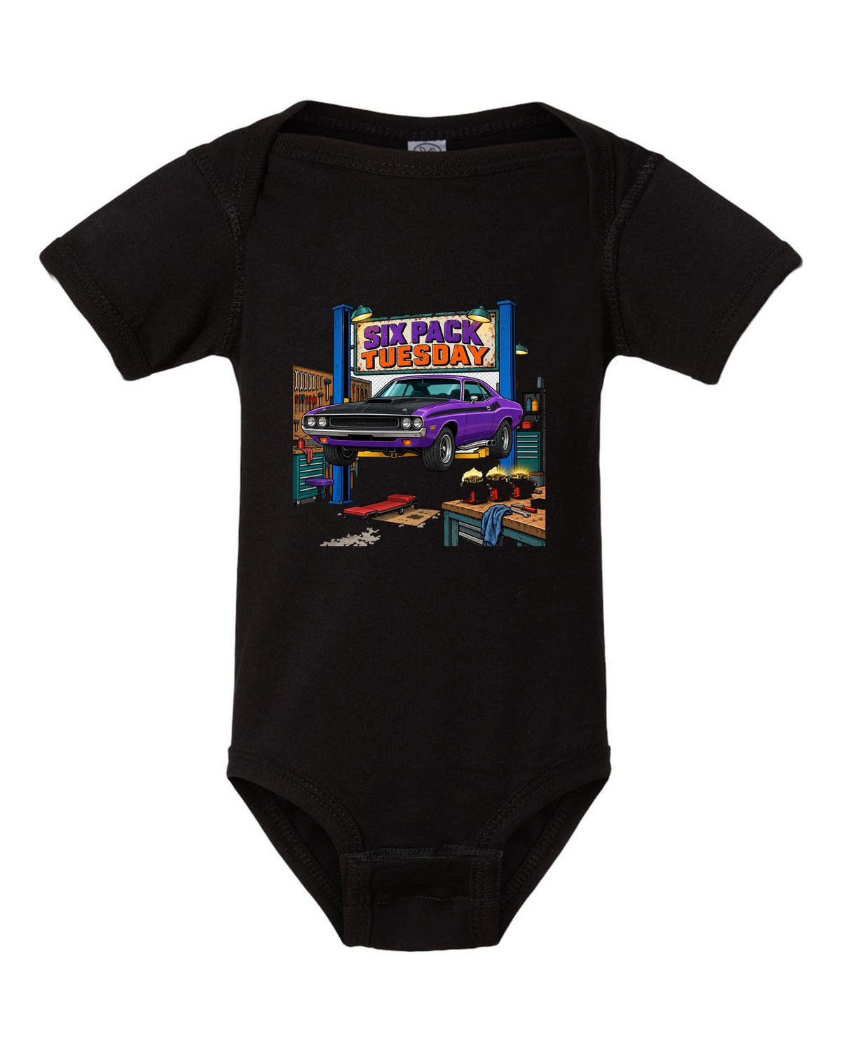 Garage workshop scene with a 1970 Dodge Challenger T/A on a lift and Six Pack Tuesday text black baby onesie front view with the design
