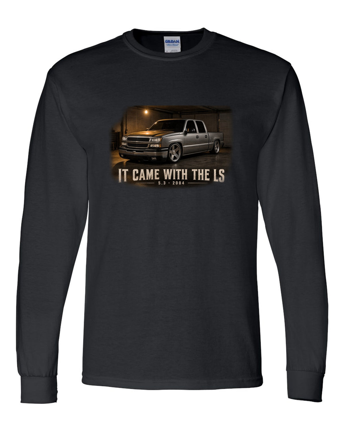 2004 Chevy Silverado crew cab in a garage night scene, print black long sleeve front view with the design