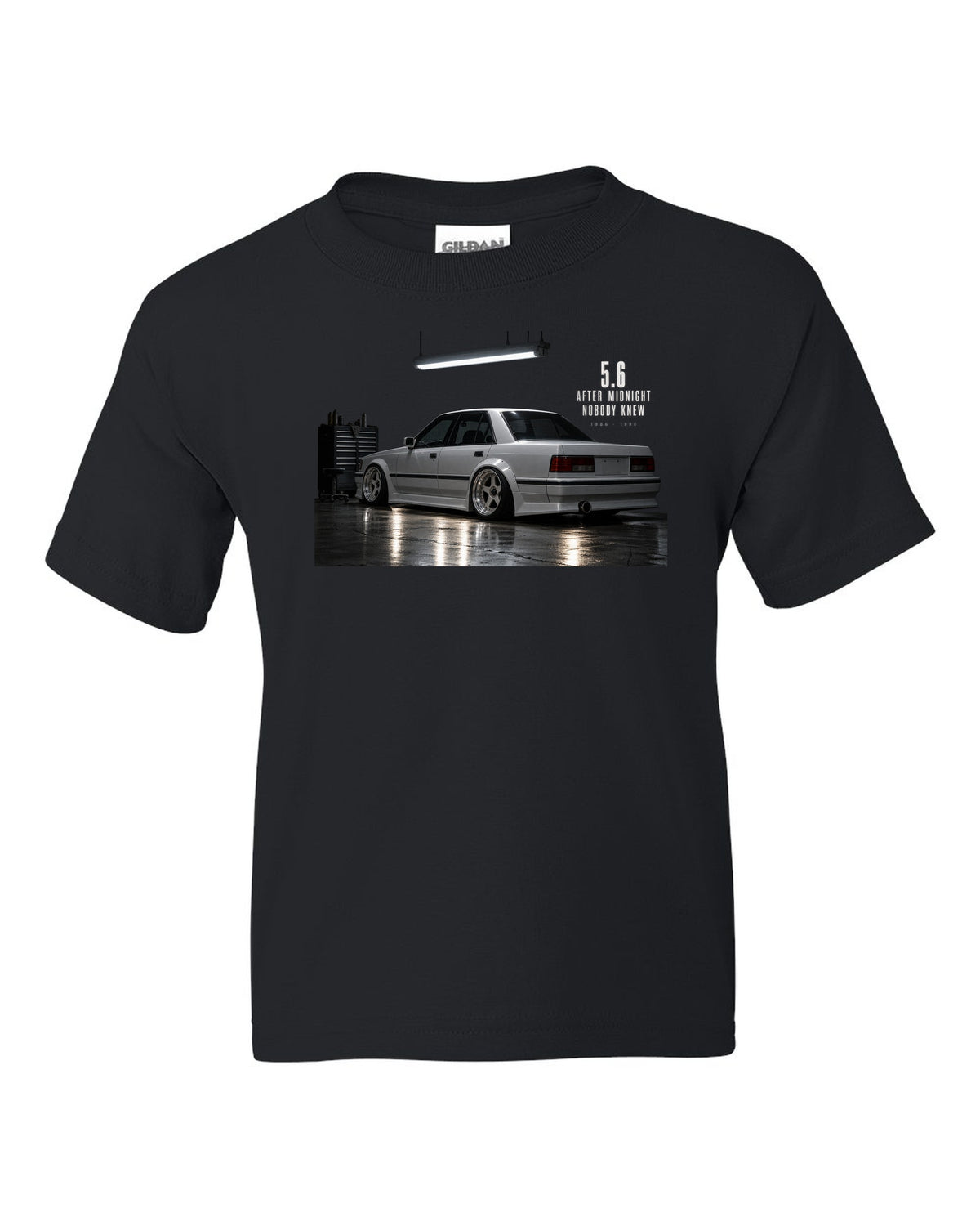 print of a Mercedes W124 300E 5.6 Hammer in a night garage with the text 5.6 After Midnight Nobody Knew black kids tee front view with the design