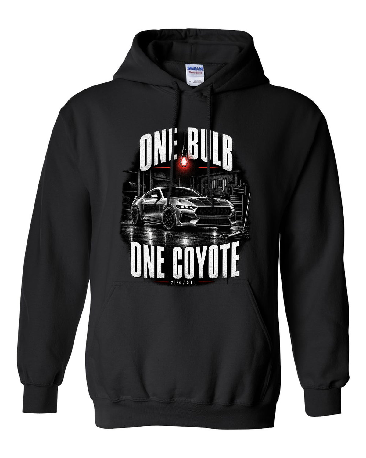 Ford Mustang S650 GT coupe in a dimly lit garage, one bulb one Coyote print black pull over hoodie front view with the design