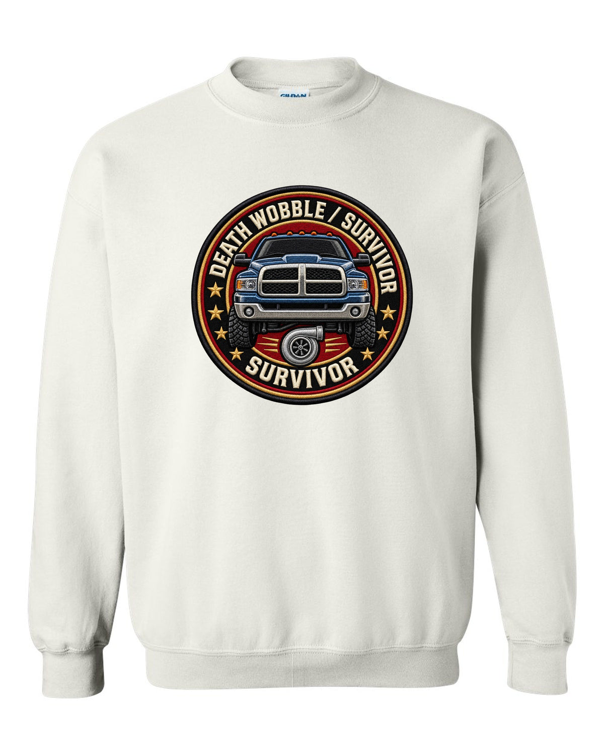 Round varsity crest print for the 2003-2009 Dodge Ram 2500 Cummins reading death wobble survivor white crewneck front view with the design