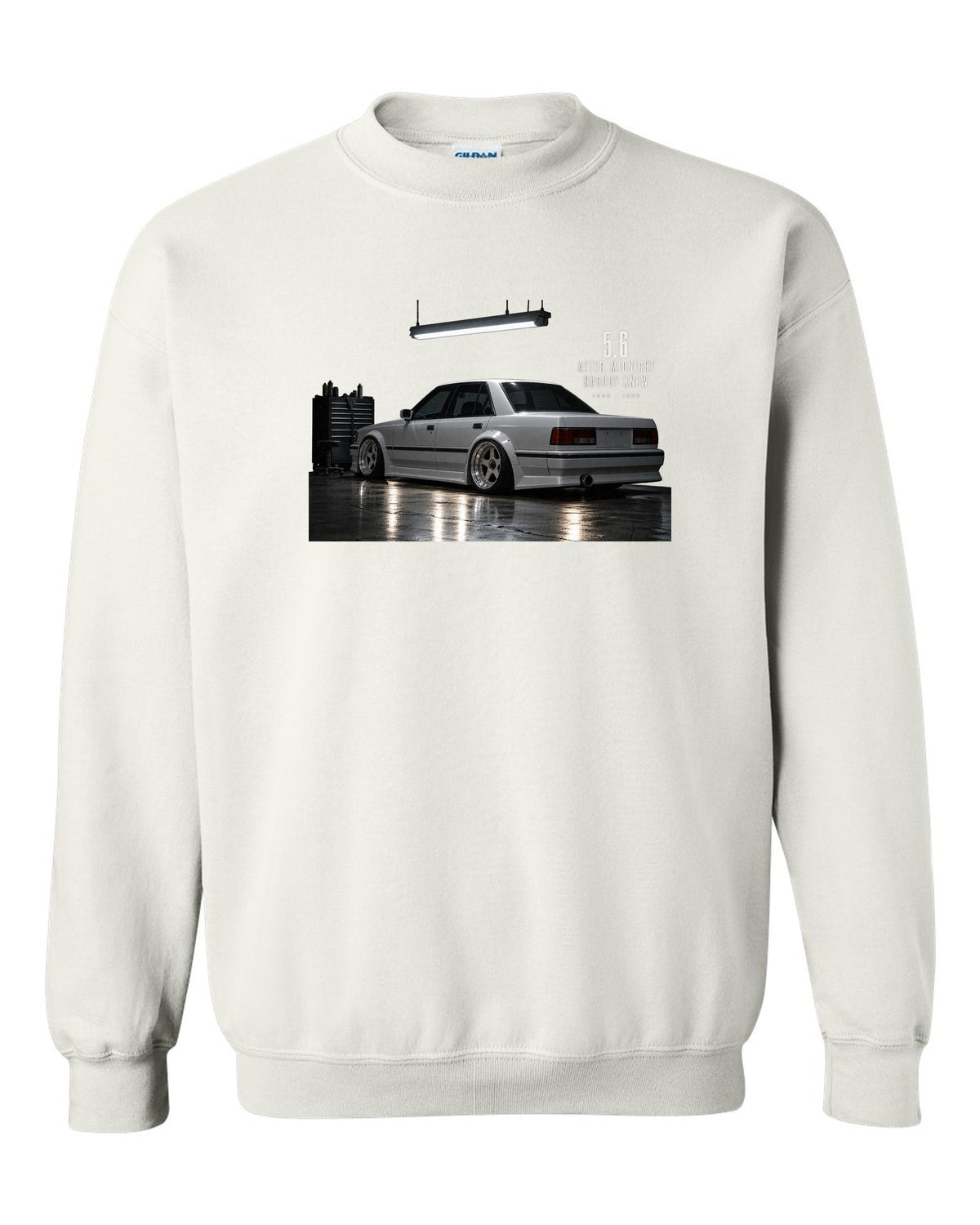 print of a Mercedes W124 300E 5.6 Hammer in a night garage with the text 5.6 After Midnight Nobody Knew white crewneck front view with the design