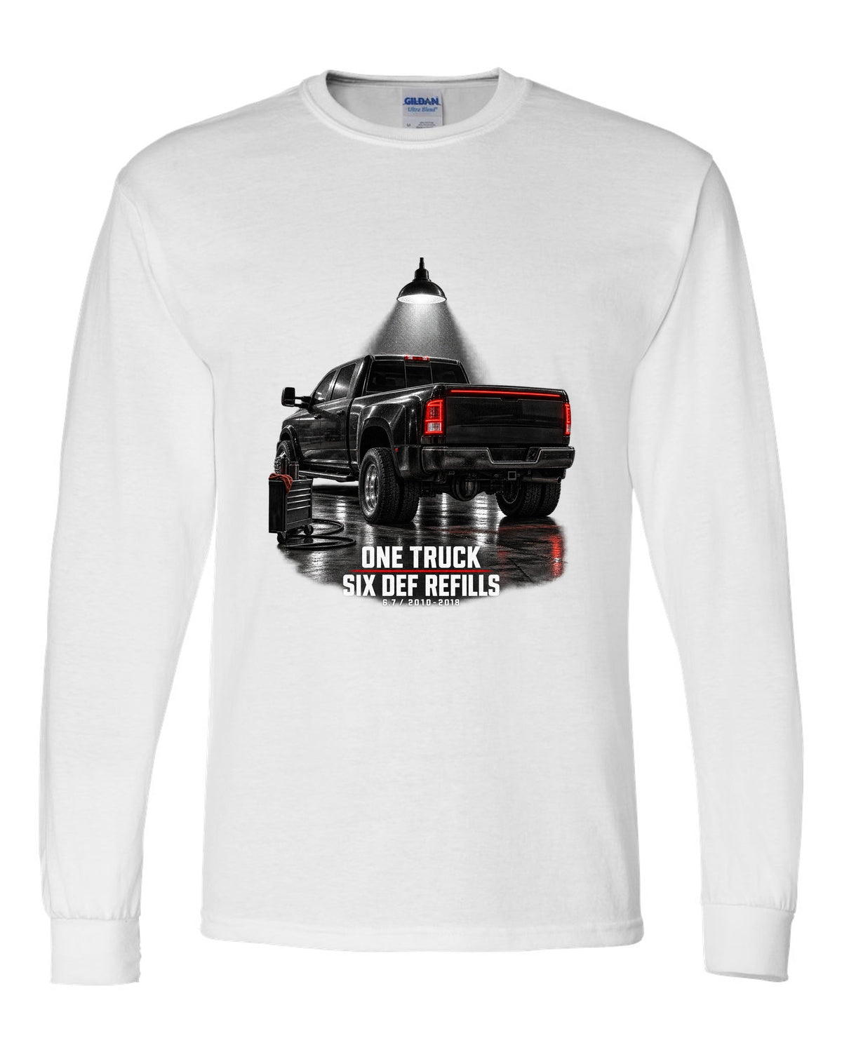 Ram 3500 4th gen dually 6.7 in a night garage with the text One truck, six DEF refills white long sleeve front view with the design