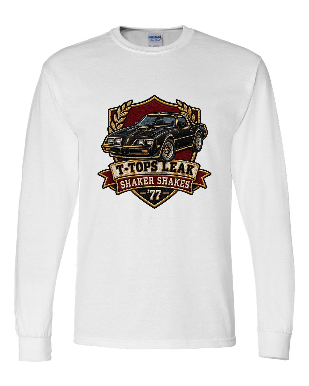Varsity crest print for a 1977 Pontiac Firebird Trans Am with the text T-Tops Leak, Shaker Shakes, '77 white long sleeve front view with the design