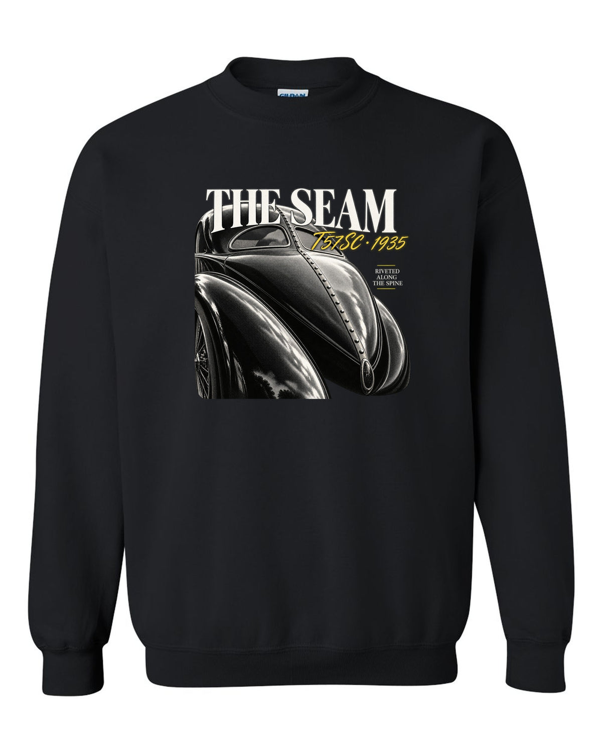 Close macro print of the riveted dorsal seam on a 1935 Bugatti Type 57SC Atlantic black crewneck front view with the design