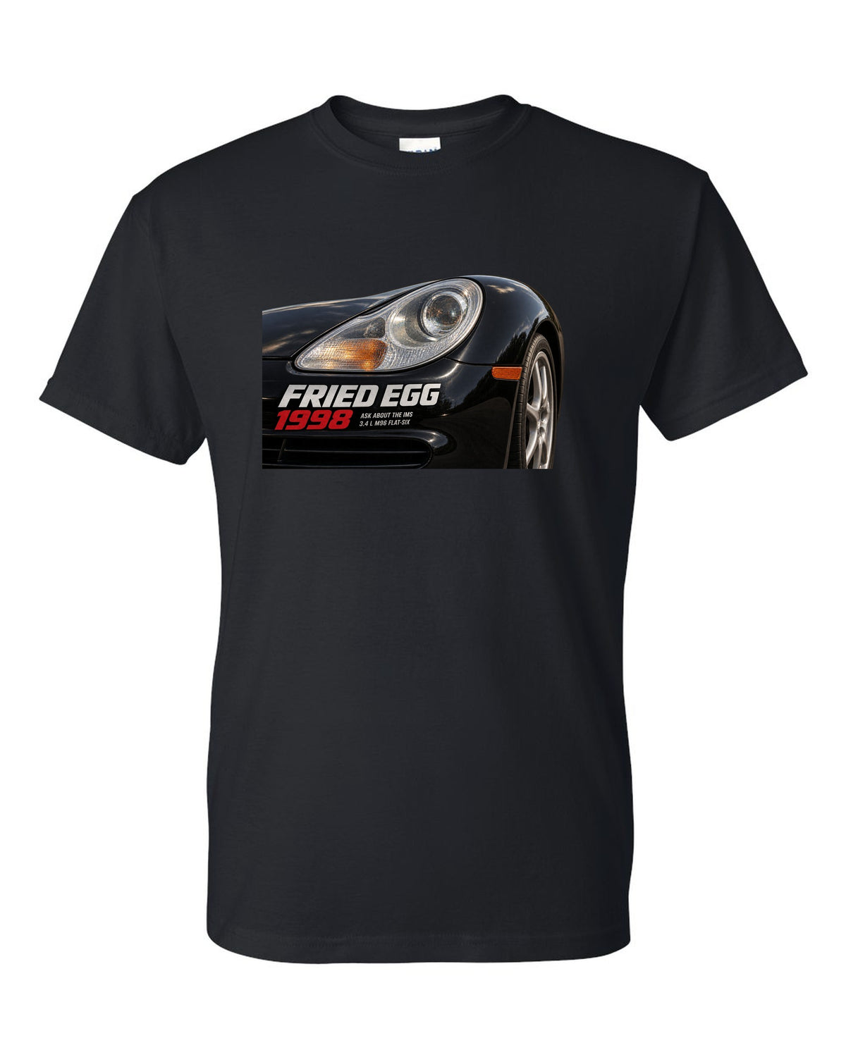 Close-up detail print of the Porsche 911 996 Fried Egg lamp with IMS joke text black t-shirt front view with the design