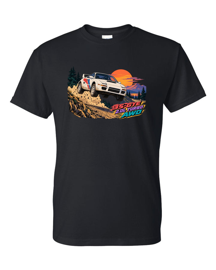 Cel-shaded anime Toyota Celica GT-Four ST185 jumping on a gravel mountain pass black t-shirt front view with the design